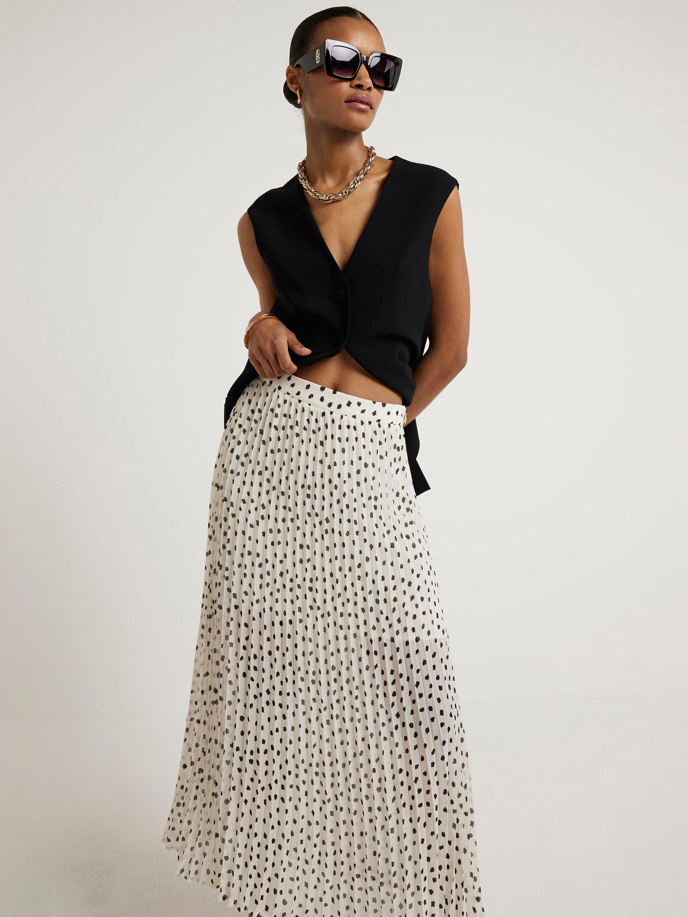 Long pleated polka dot skirt best sale