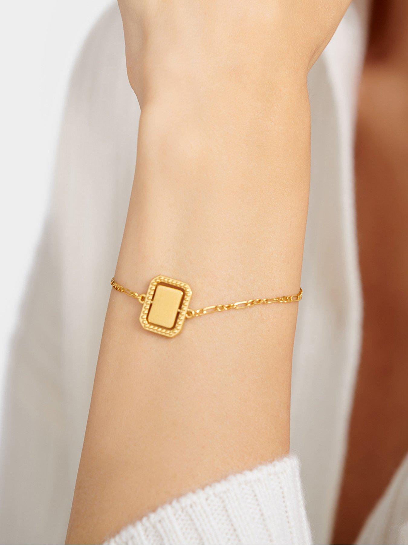 katie-loxton-optimism-waterproof-gold-spinning-amulet-braceletstillFront