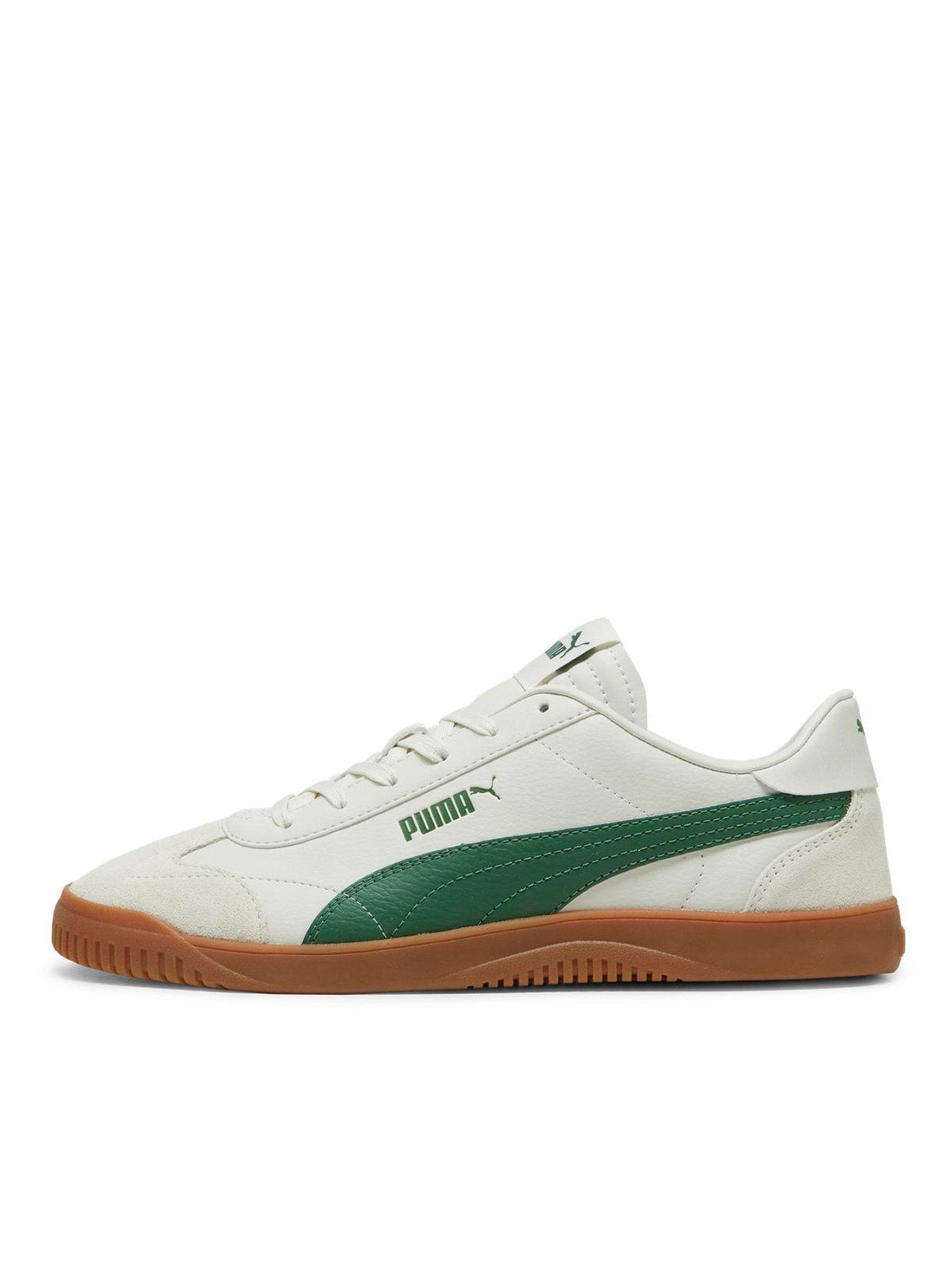 Green and store white puma trainers