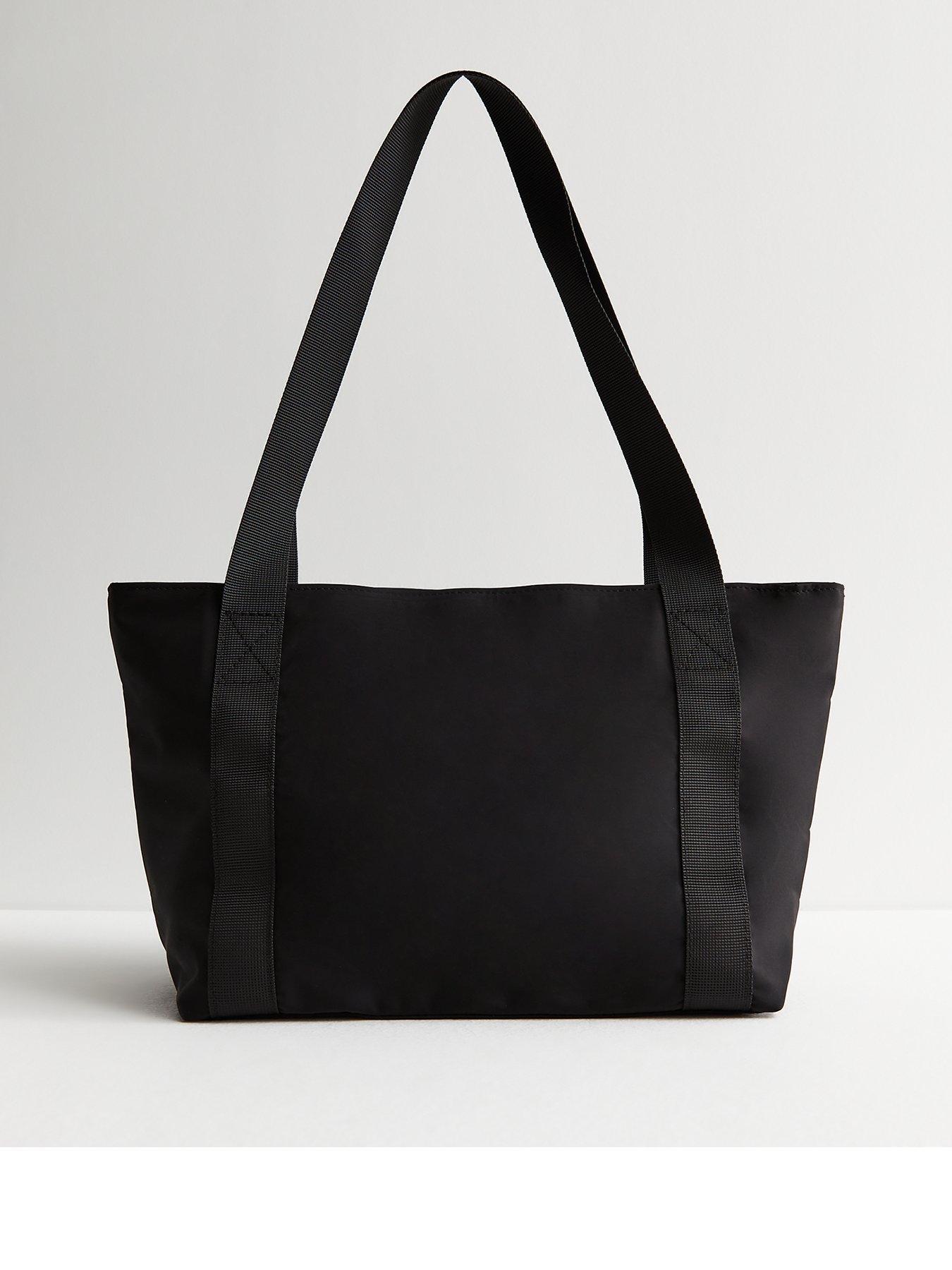 Black pocket front bucket bag hotsell