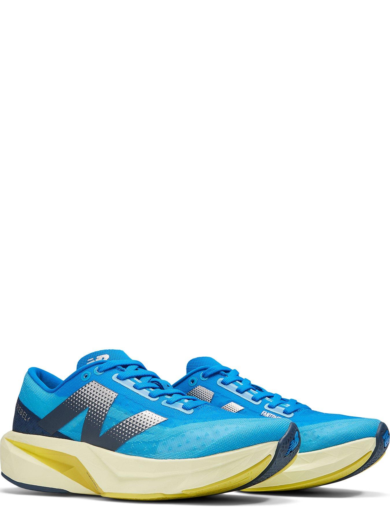 new-balance-womens-running-fuelcell-rebelv4-blueyellowstillFront