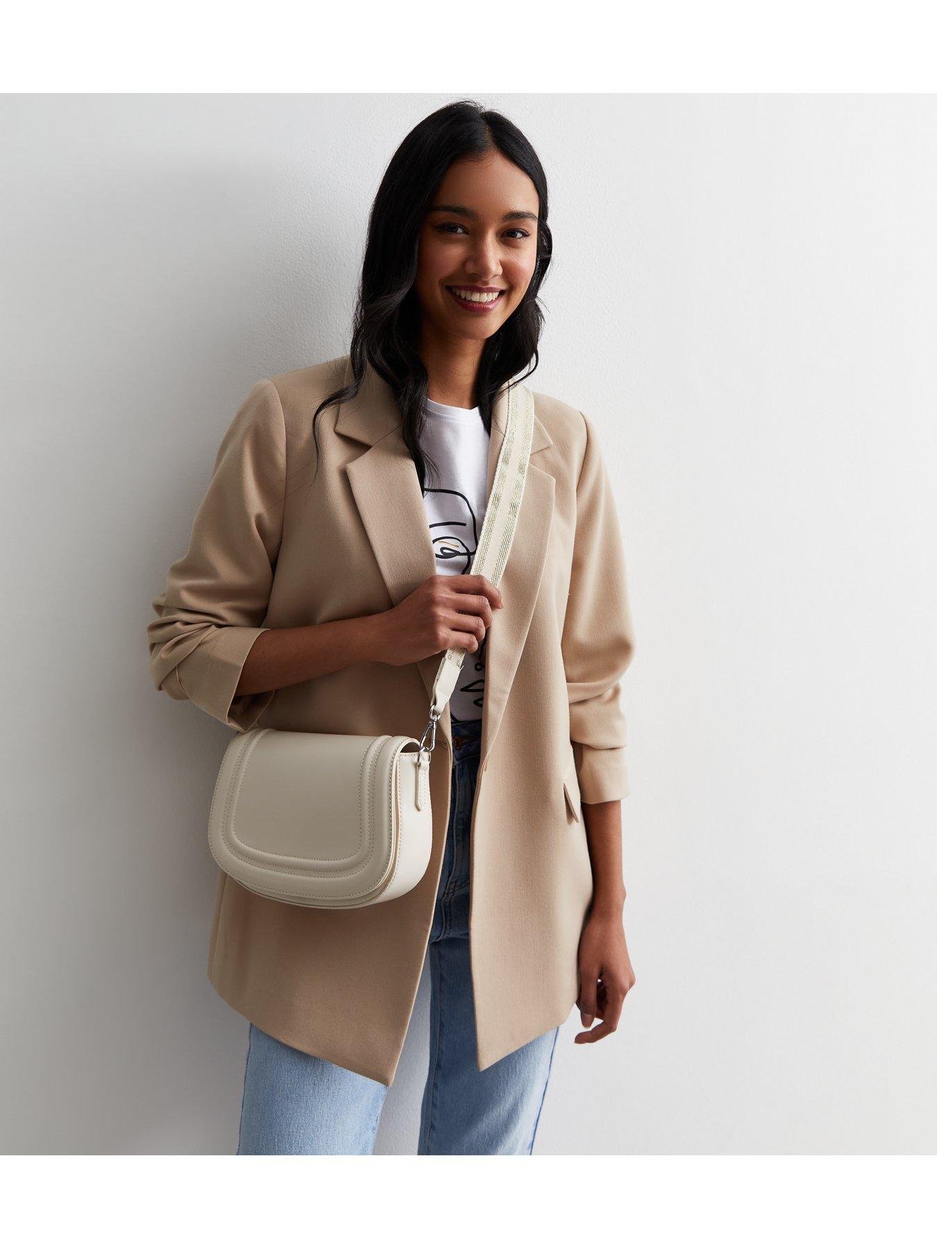 new-look-cream-webbed-cross-body-saddle-bagstillFront