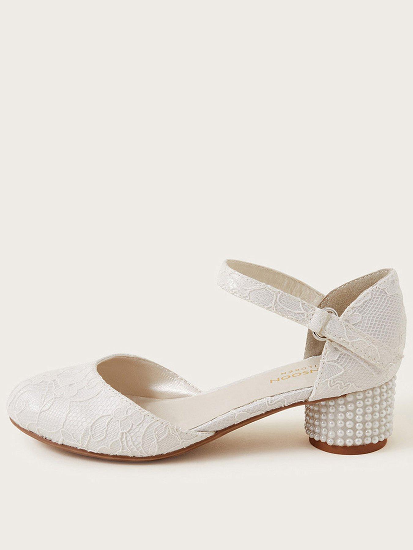 Ladies cream store low heeled shoes