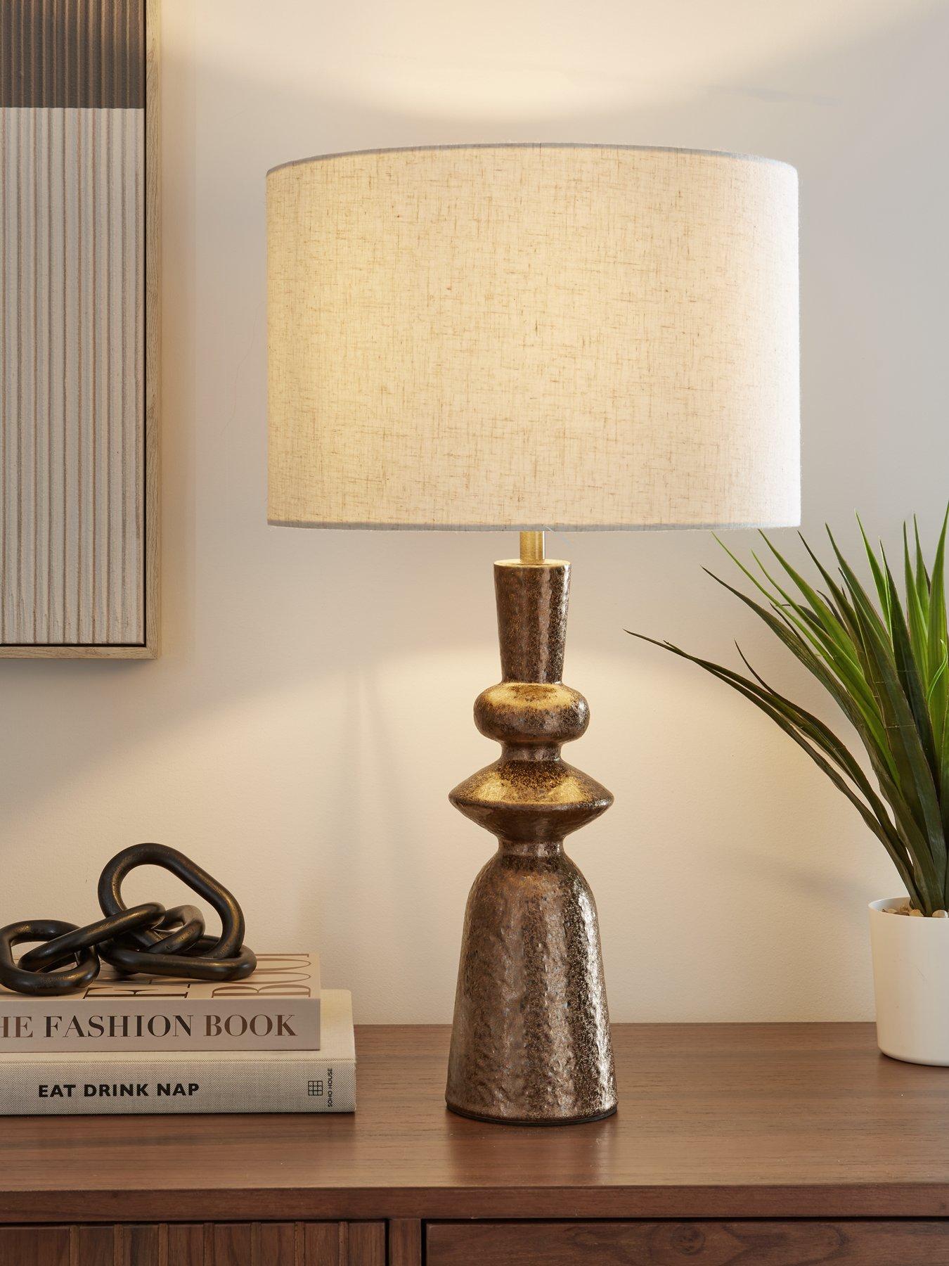 Image 1 of 6 of The Very Collection Totem Ceramic Distressed Bronze Table Lamp