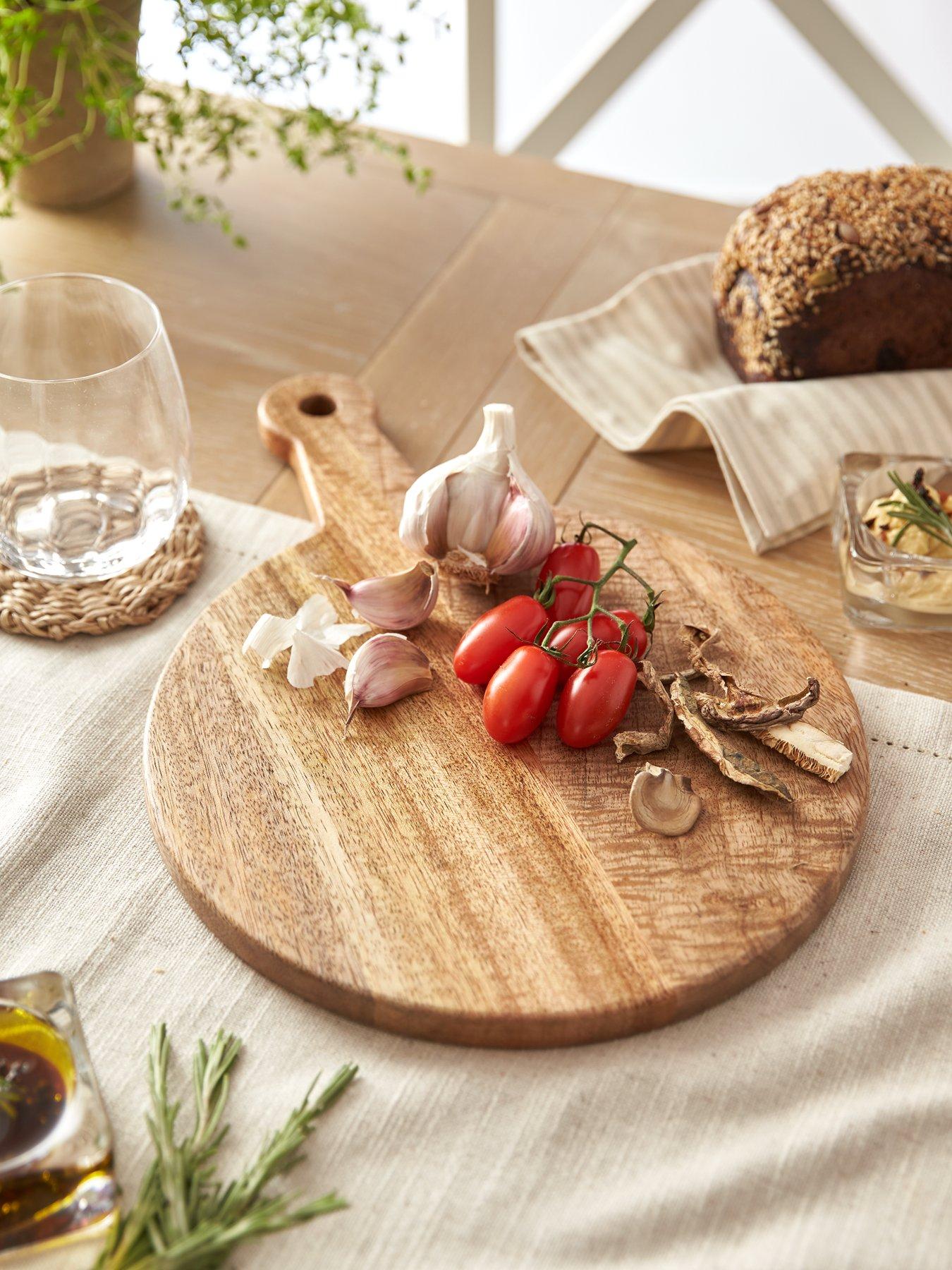 Image 1 of 6 of The Very Collection Mango Small Round Serving Board with Handle