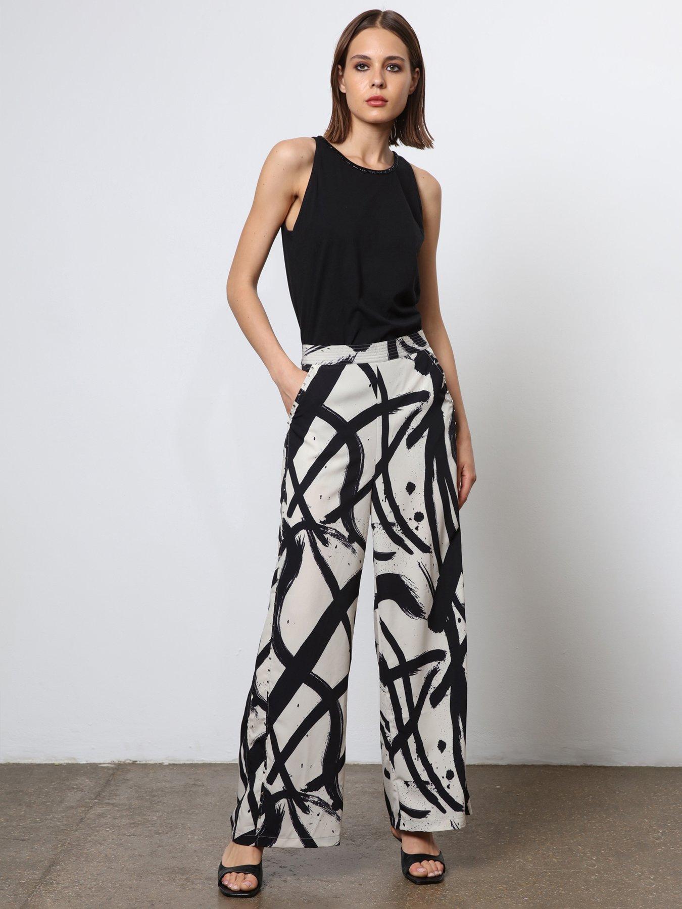 religion-abstract-wide-leg-trousers-white