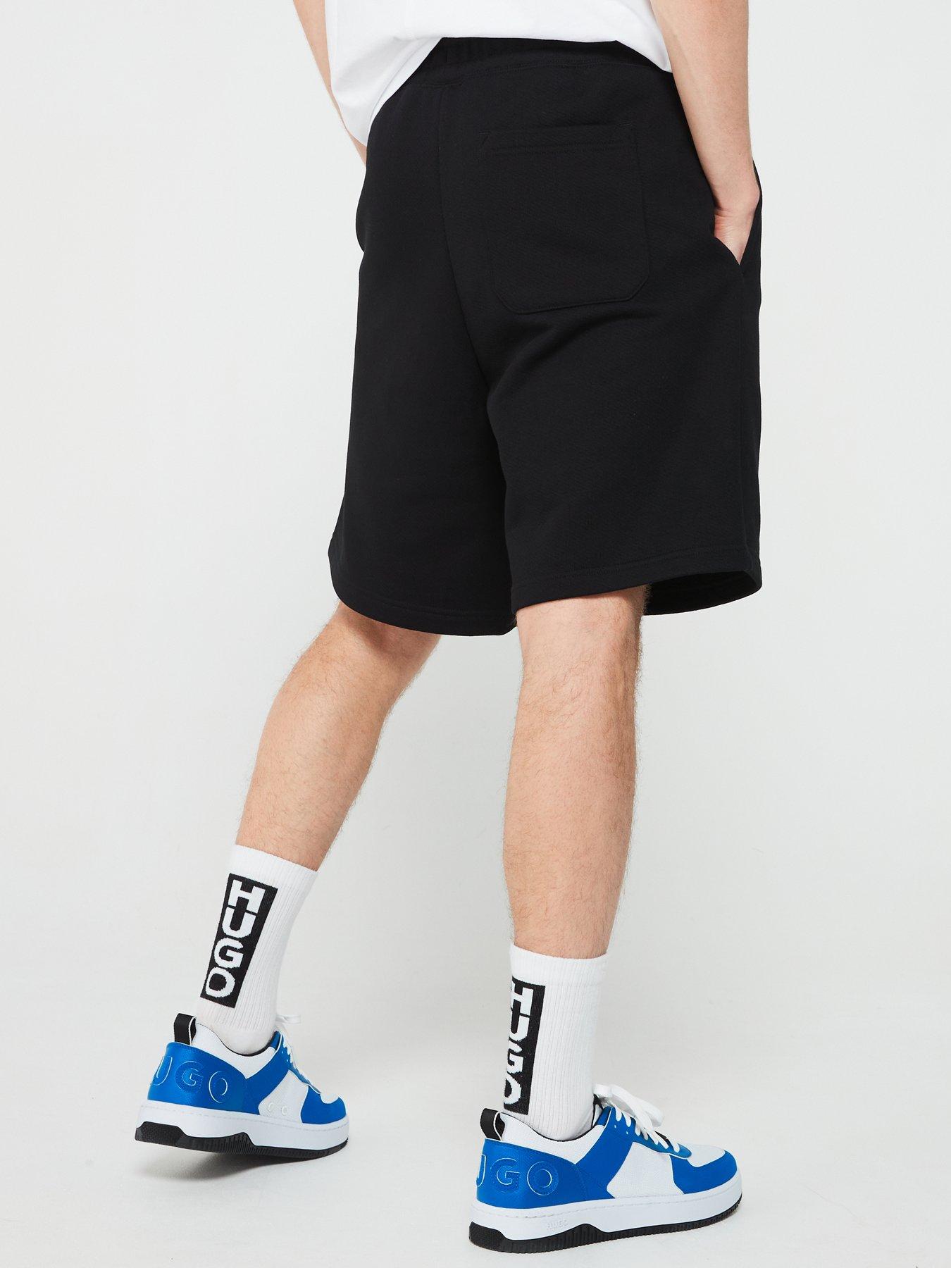 hugo-blue-nomario-oversized-international-logo-jersey-shorts-blackstillFront