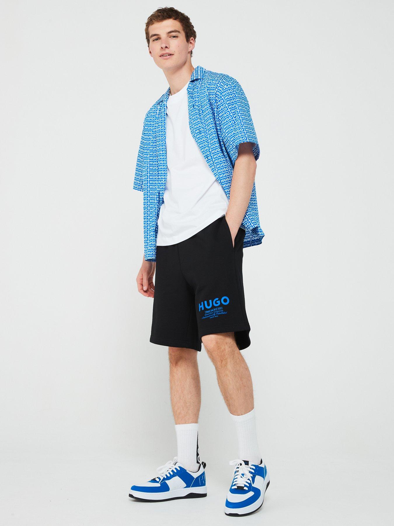 hugo-blue-nomario-oversized-international-logo-jersey-shorts-blackback