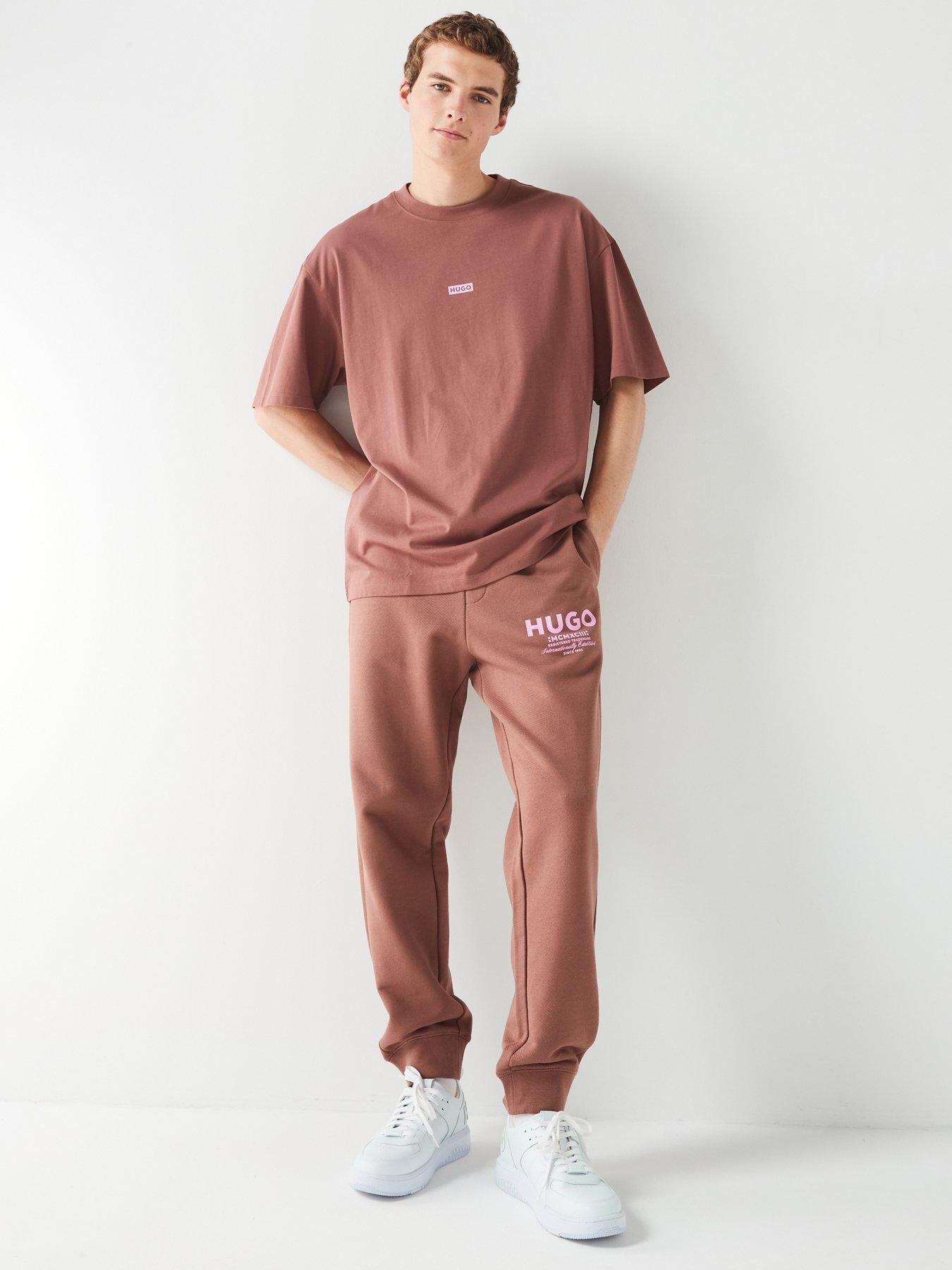 hugo-blue-nevez-oversized-international-logo-cuff-joggers-brownback