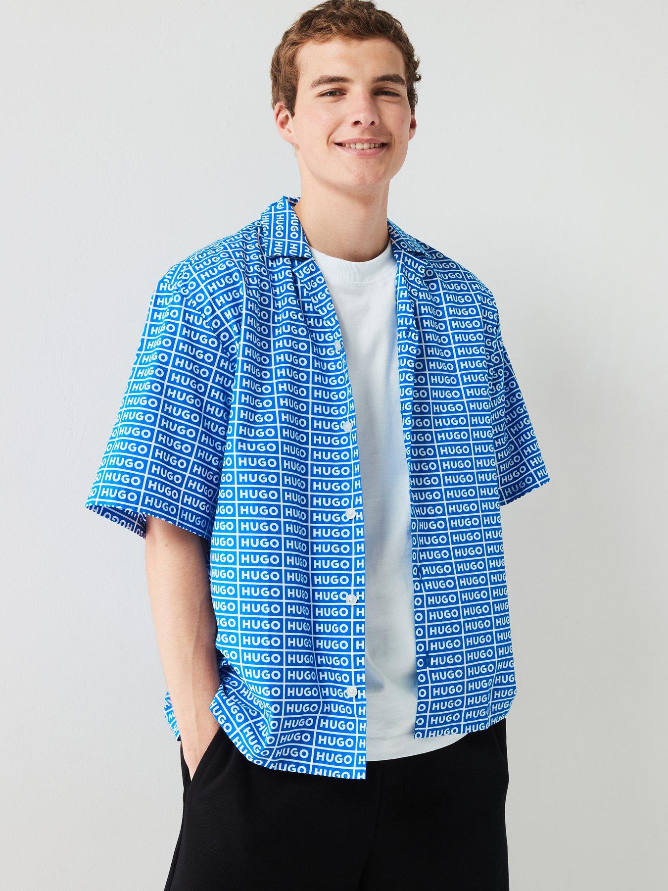 hugo-blue-eligino-oversized-all-over-logo-print-short-sleeve-shirt-blue