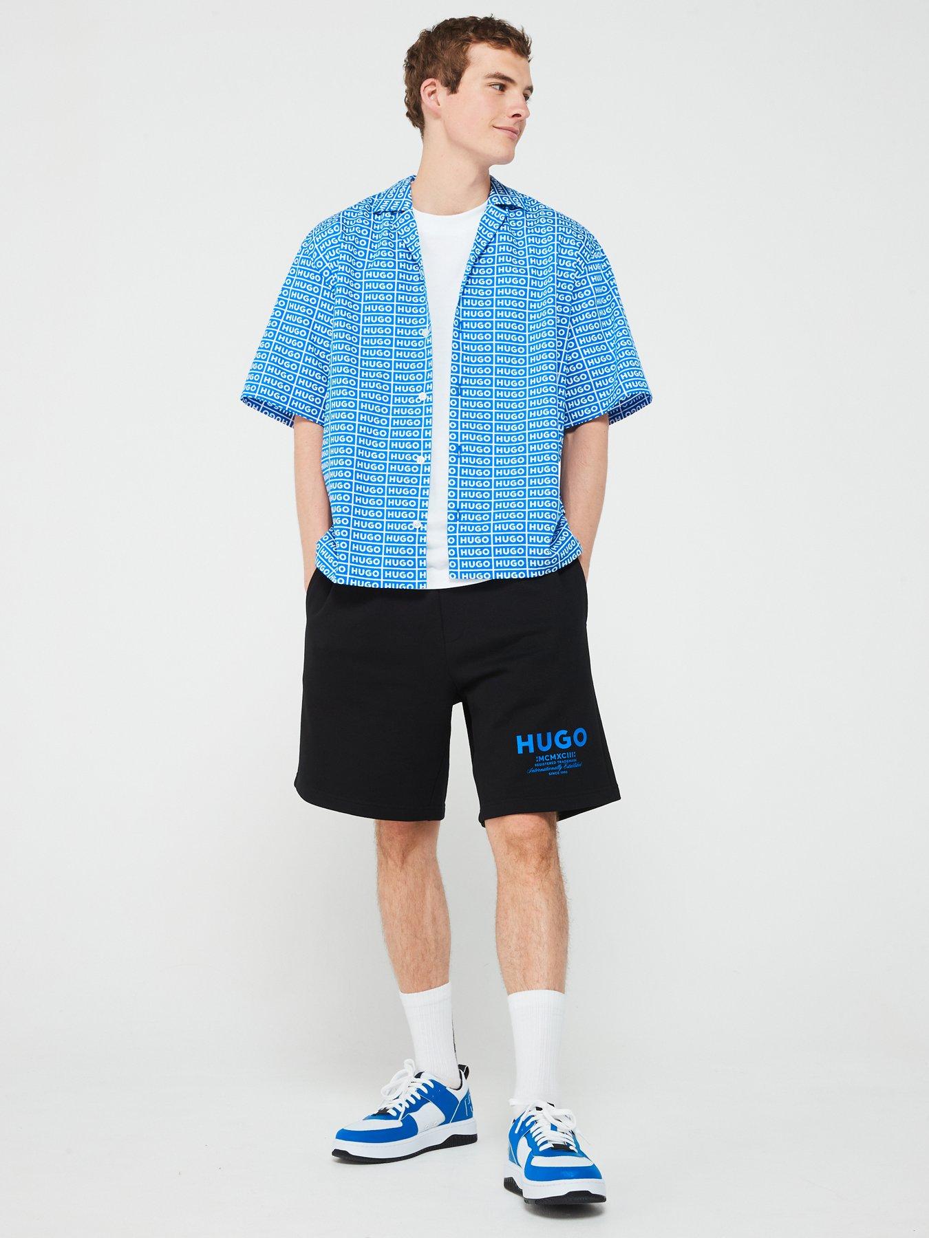 hugo-blue-eligino-oversized-all-over-logo-print-short-sleeve-shirt-blueback