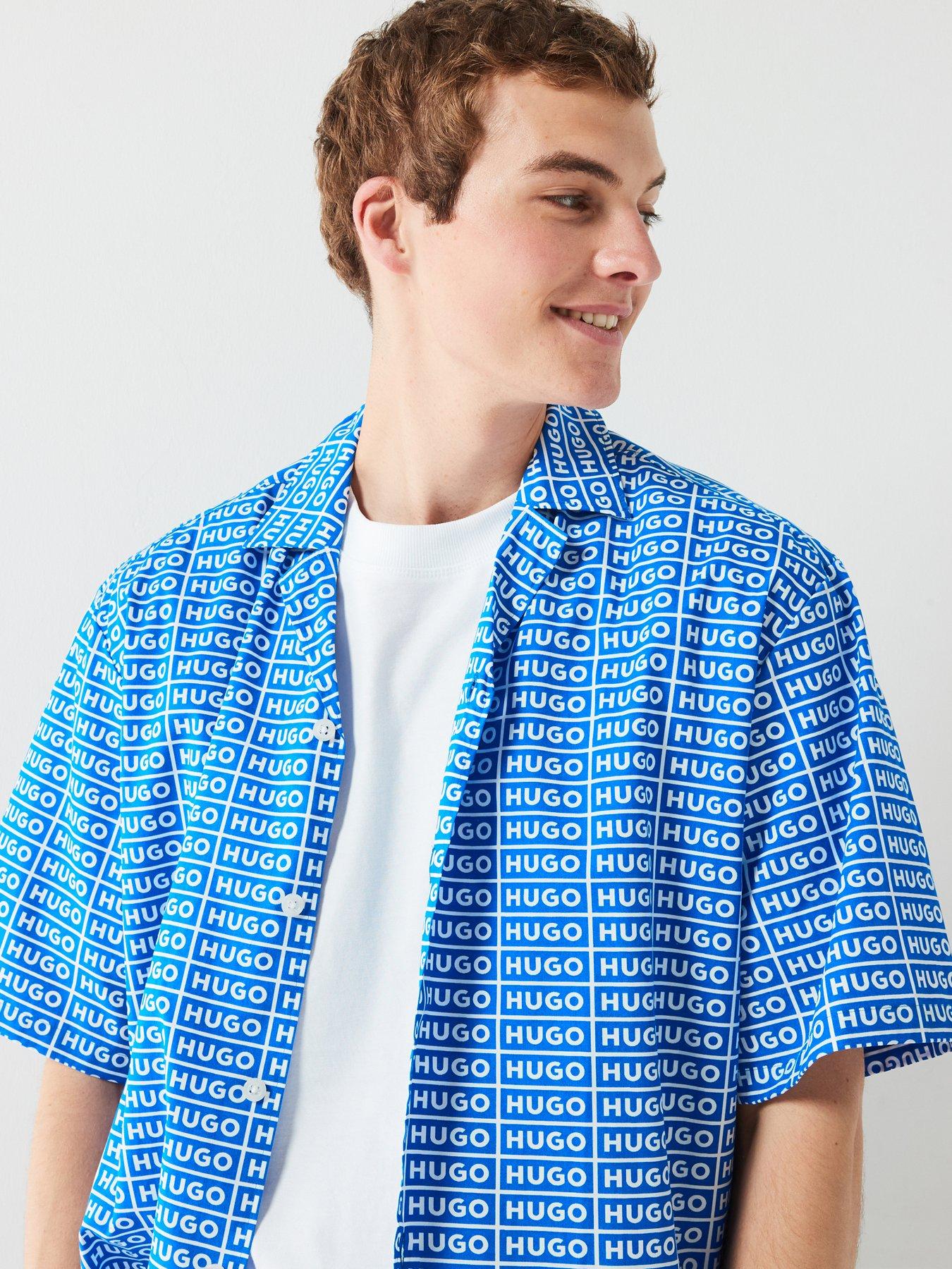 hugo-blue-eligino-oversized-all-over-logo-print-short-sleeve-shirt-blueoutfit