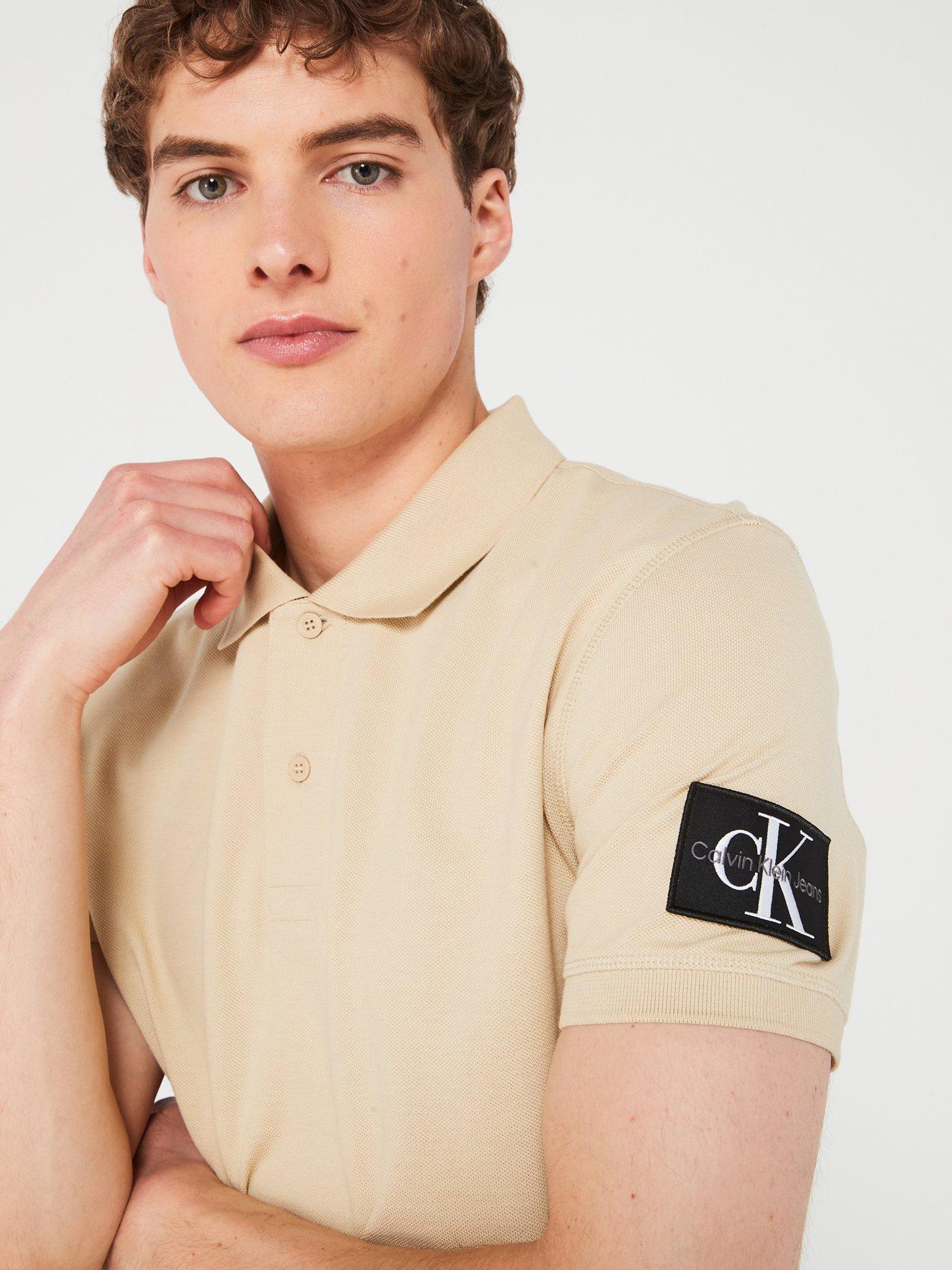 calvin-klein-jeans-calvin-klein-jeans-sleeve-badge-polo-shirt-beigeoutfit