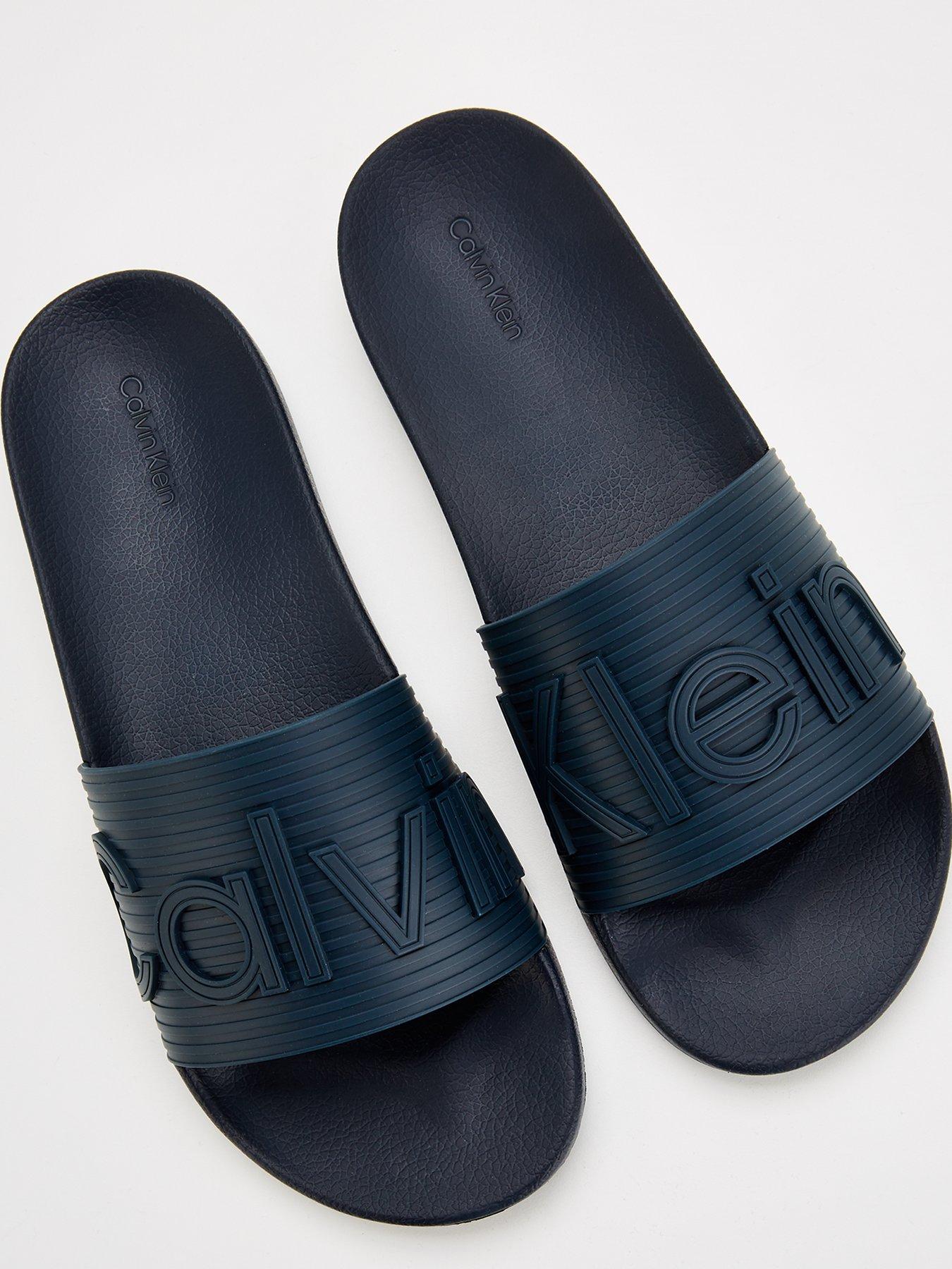 calvin-klein-calvin-klein-deboss-logo-pool-slide-navyoutfit