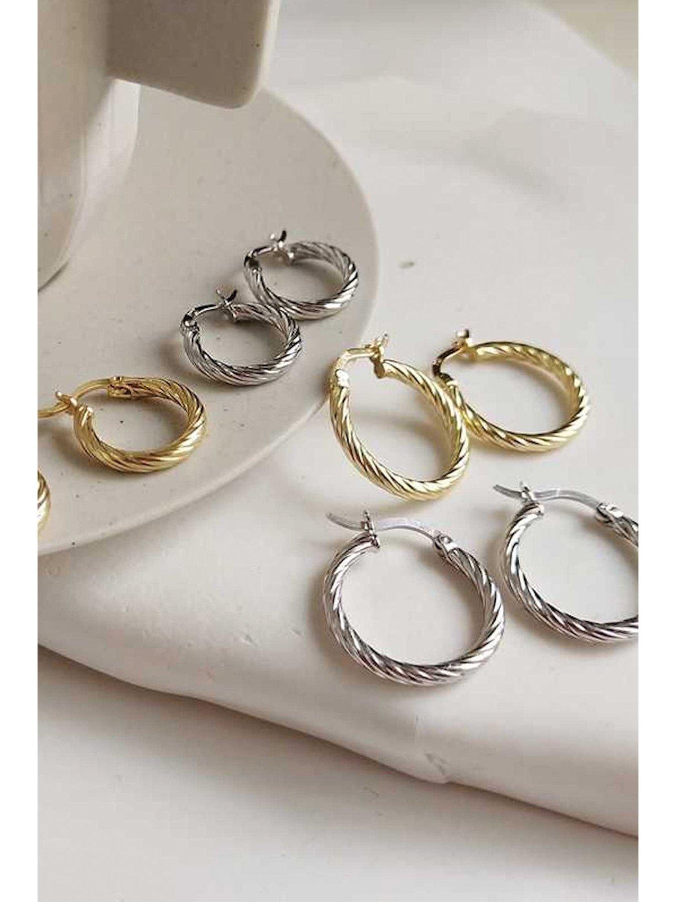 elk-bloom-small-sterling-silver-twist-huggie-hoop-earrings-silverdetail