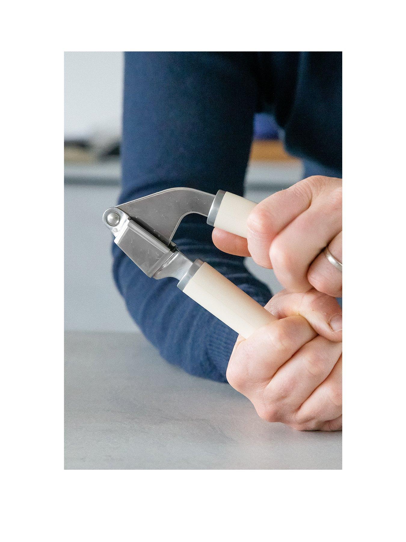 kitchenaid-stainless-steel-garlic-press-almond-creamstillFront