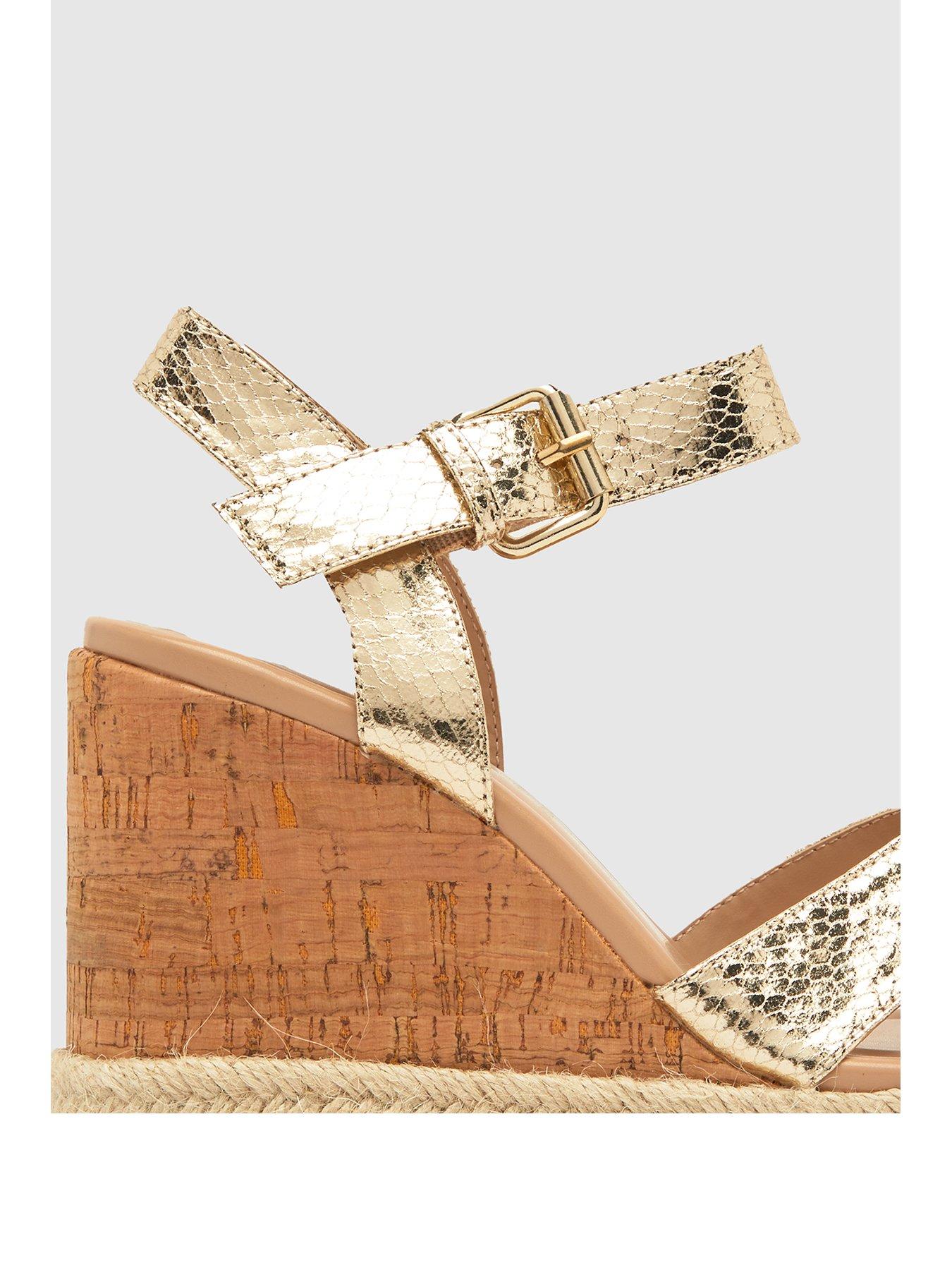 schuh-valley-cross-strap-wedge-goldstillFront