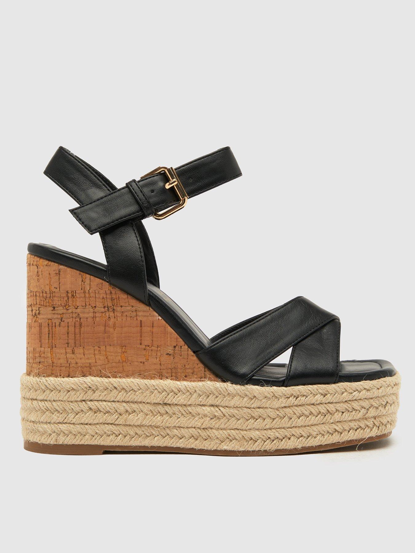 schuh-valley-cross-strap-wedge-black