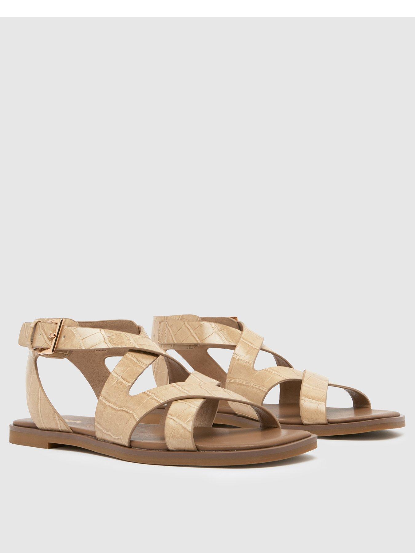 schuh-tide-croc-flat-sandals-naturalstillFront