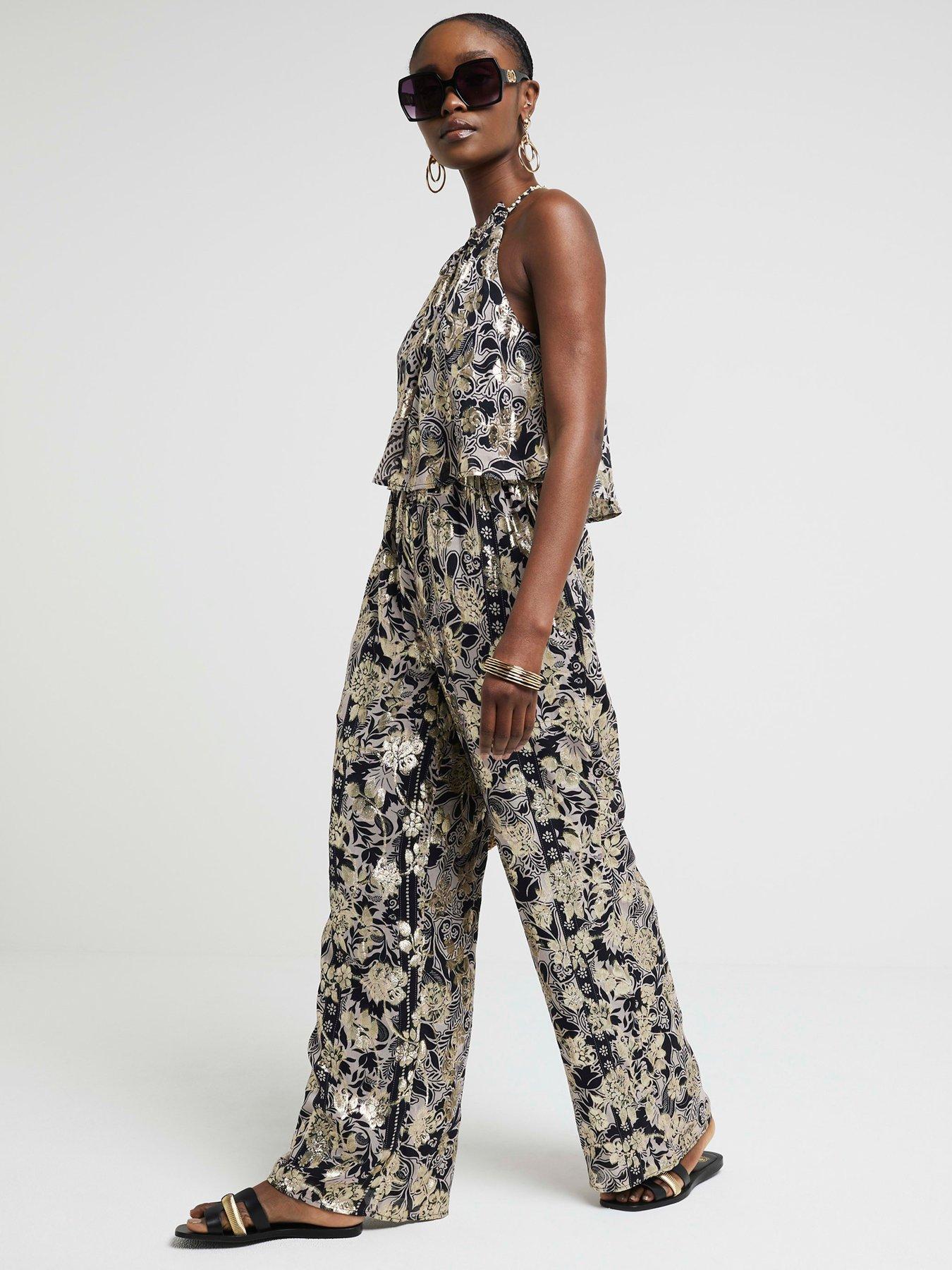 river-island-halterneck-tiered-jumpsuit-blackback