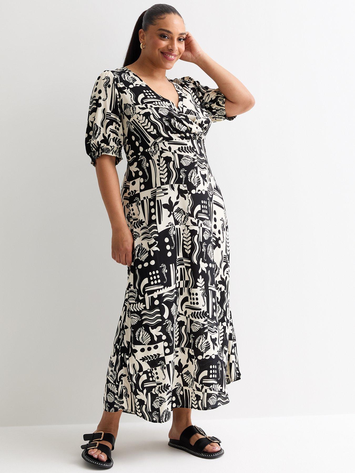 new-look-curves-black-beach-print-wrap-puff-sleeve-midifront