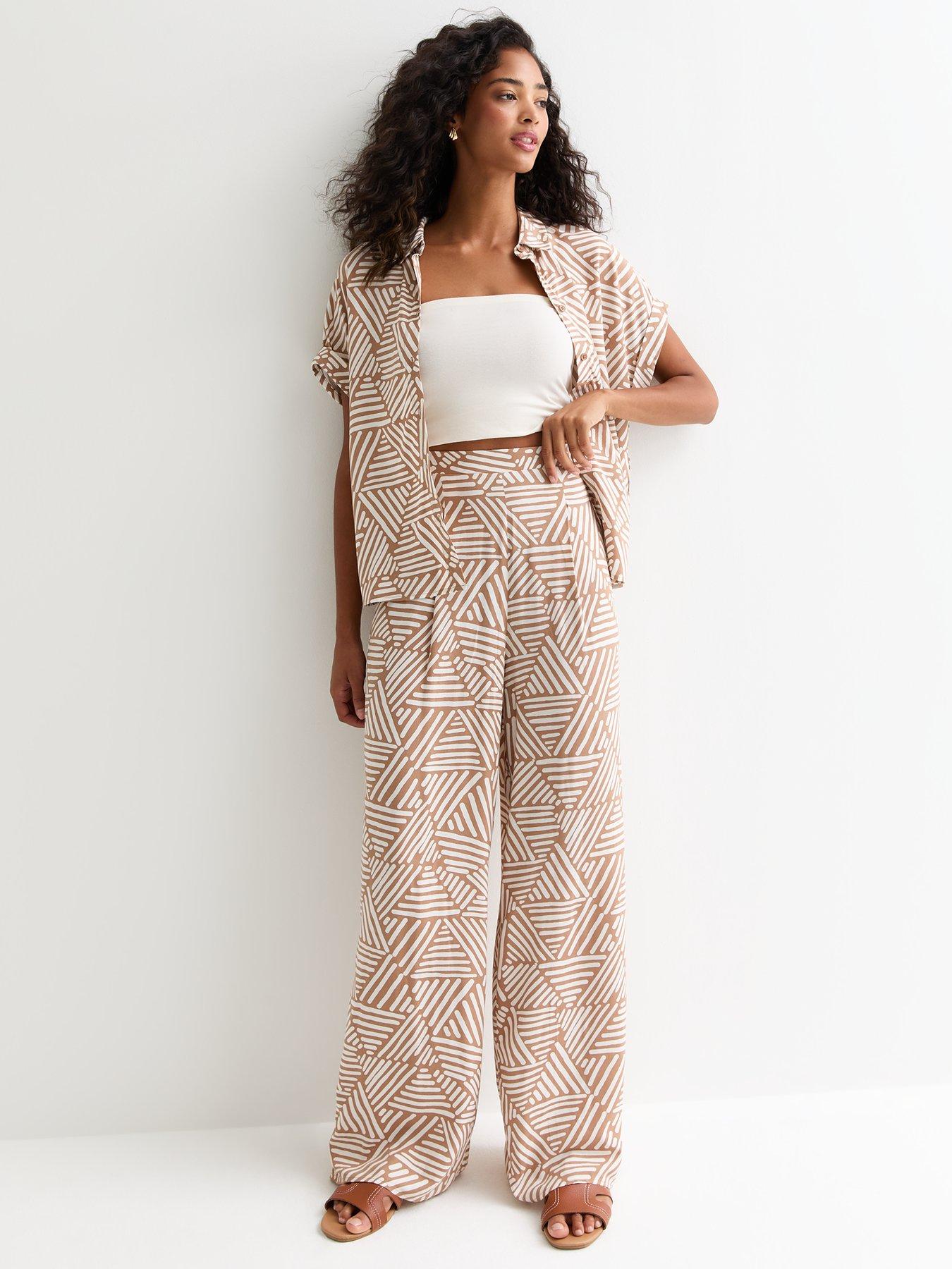 new-look-camel-triangle-print-wide-leg-trousers