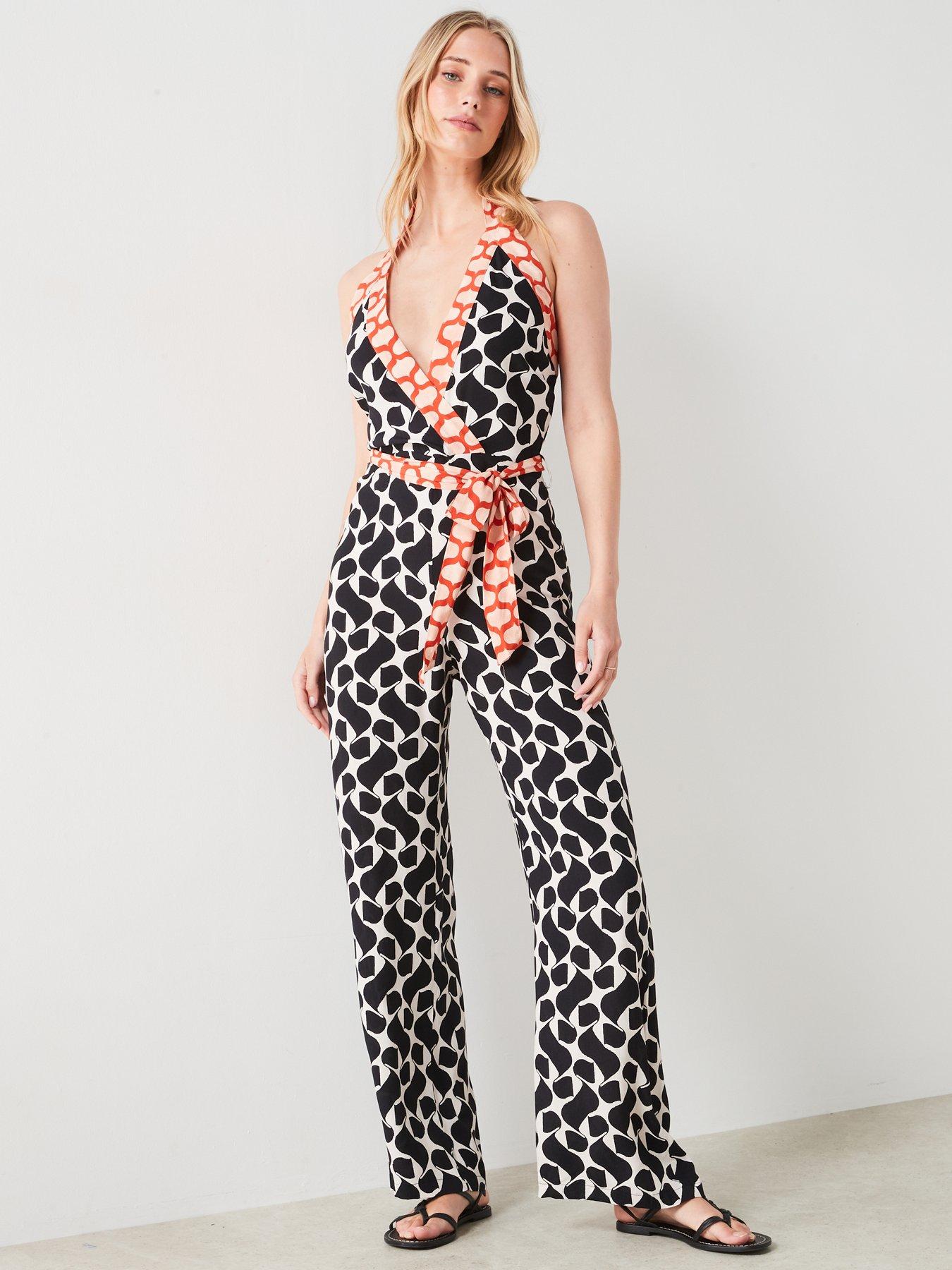 Image 5 of 6 of Mango Printed Jumpsuit With Bow - Black
