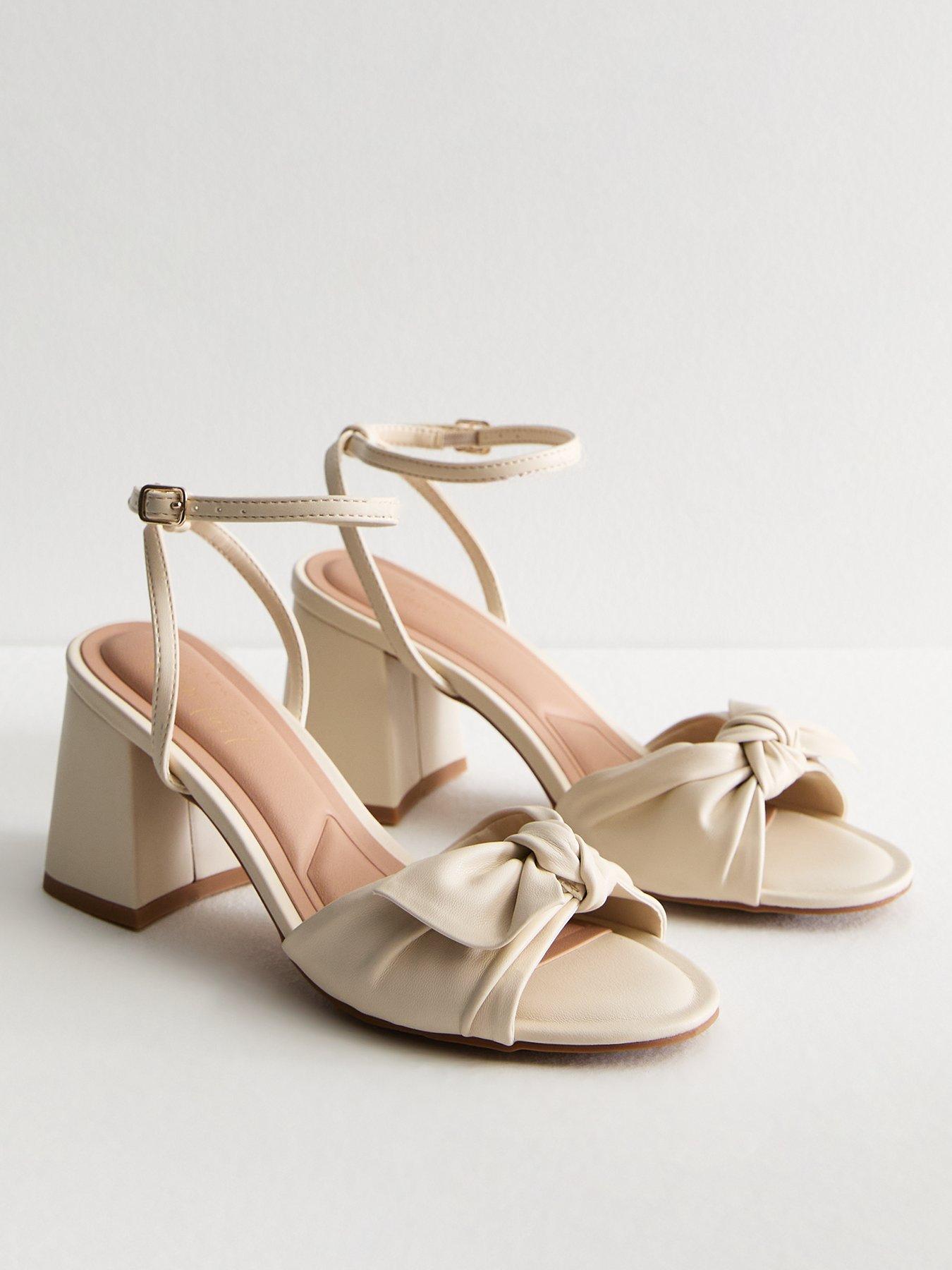 new-look-off-white-leather-look-bow-trim-block-heel-sandalsstillFront