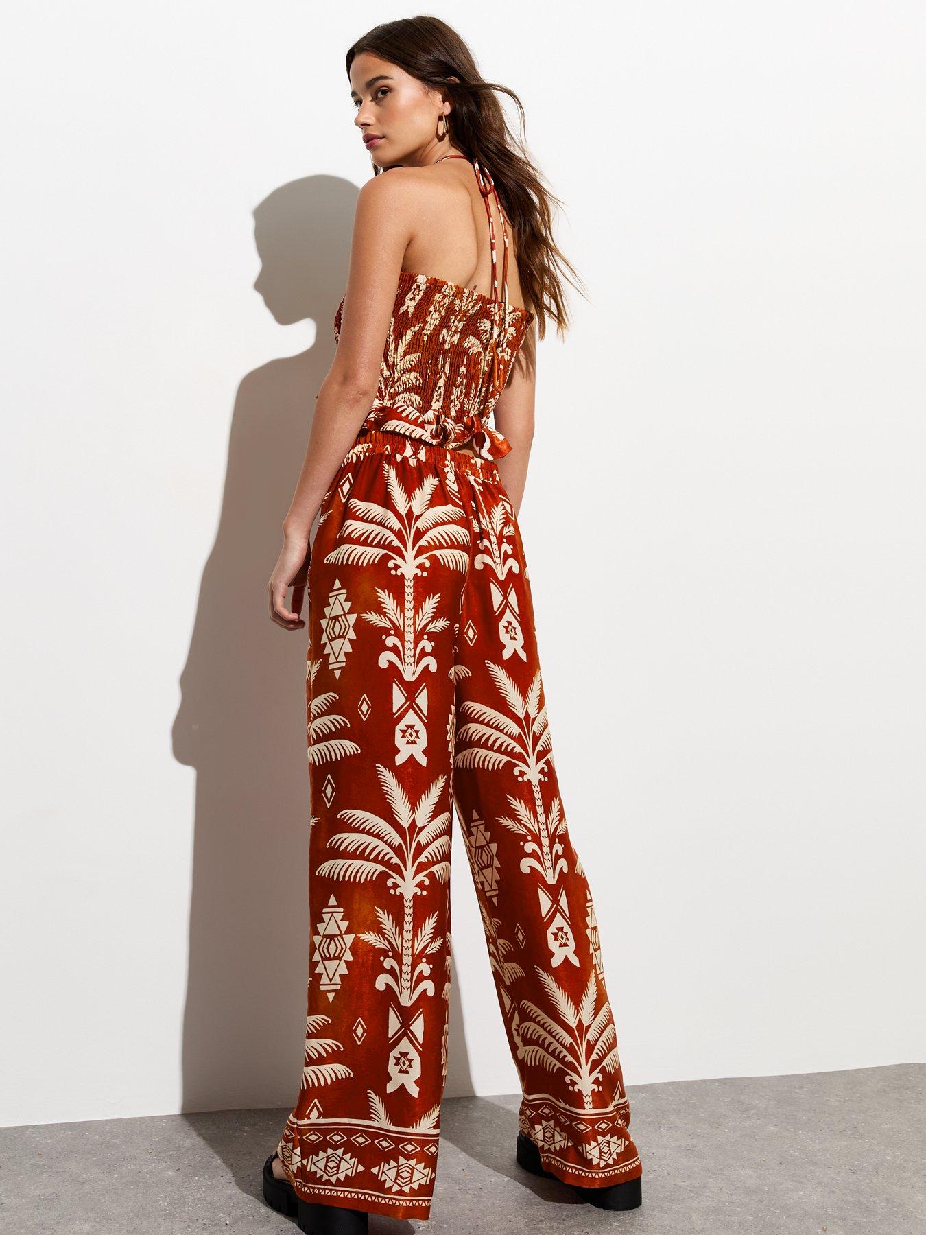 new-look-rust-tropical-print-satin-wide-leg-trousersstillFront