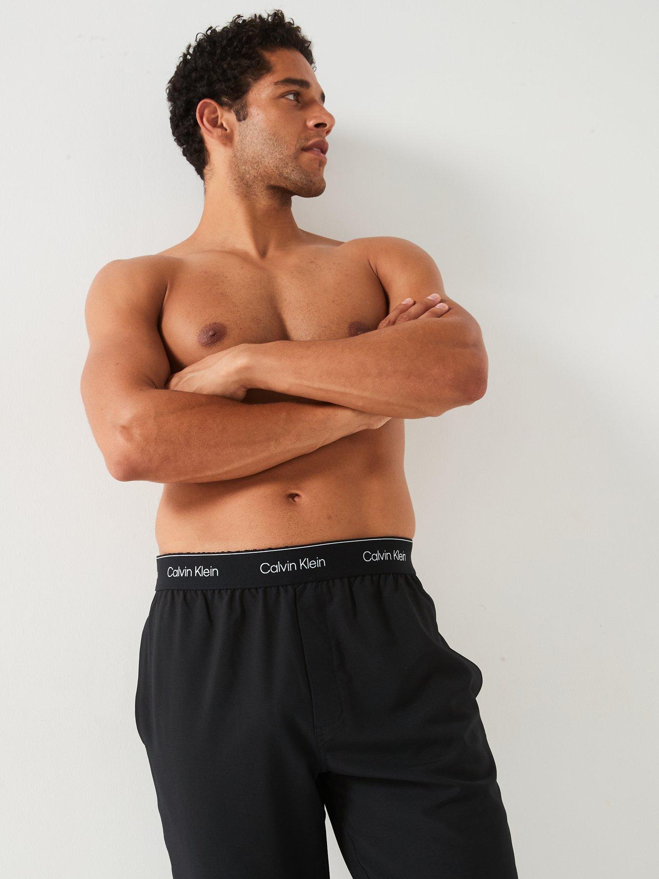 calvin-klein-sport-calvin-klein-sport-waistband-logo-open-hen-track-trousers-blackoutfit