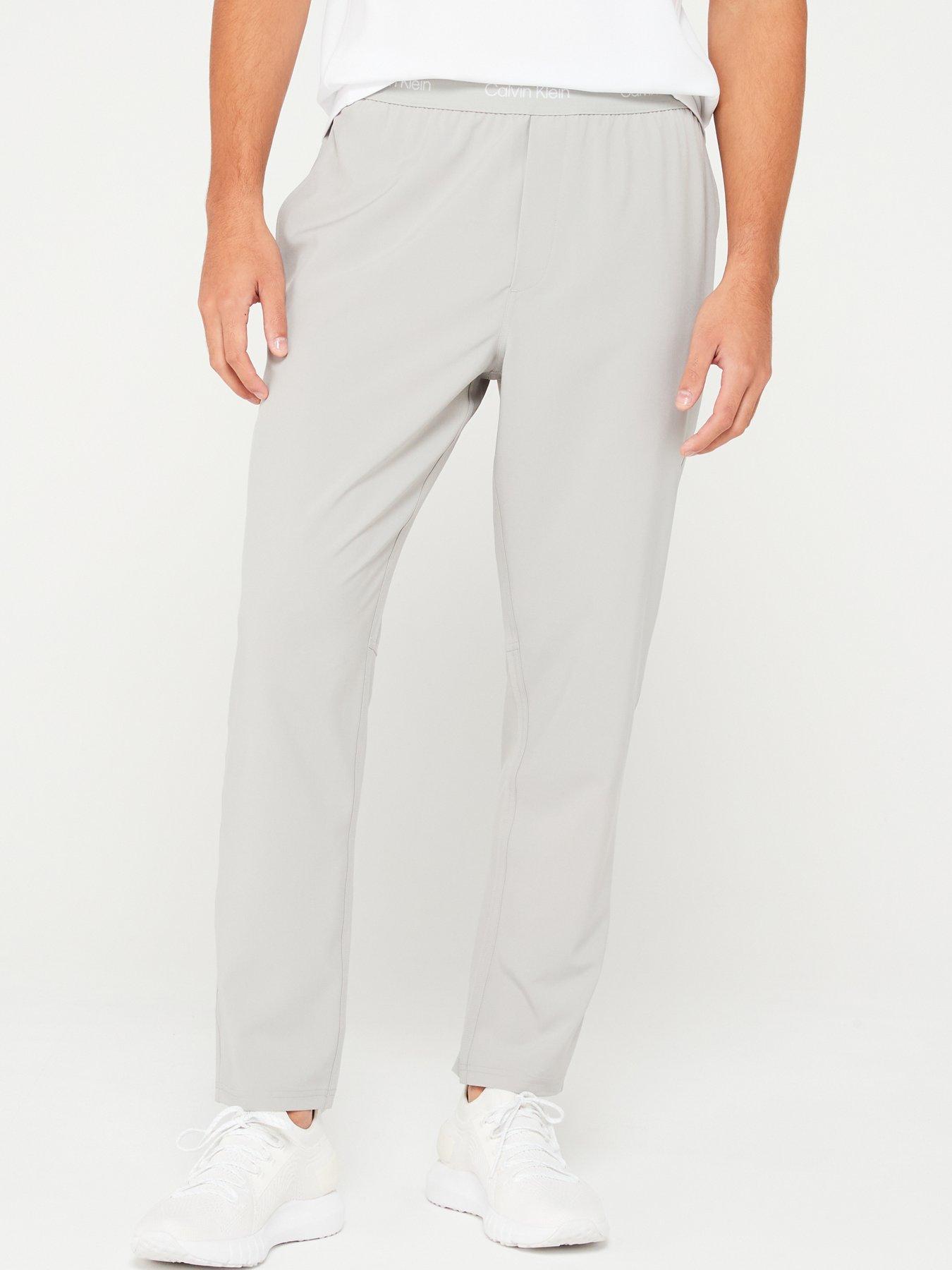 calvin-klein-sport-calvin-klein-sport-waistband-logo-open-hen-track-trousers-light-grey