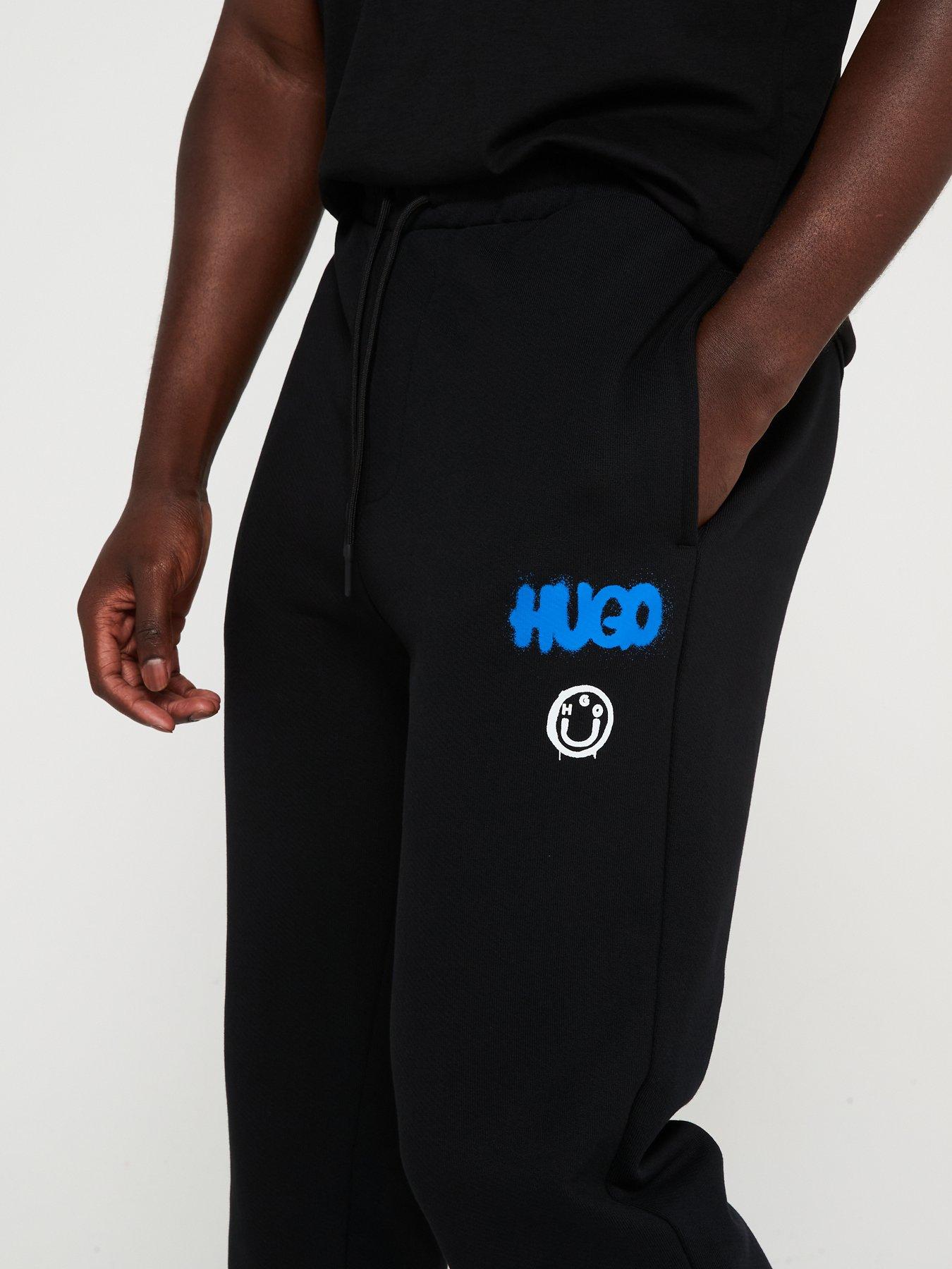 hugo-blue-nimaytro-loose-fit-spray-logo-cuff-joggers-blackoutfit