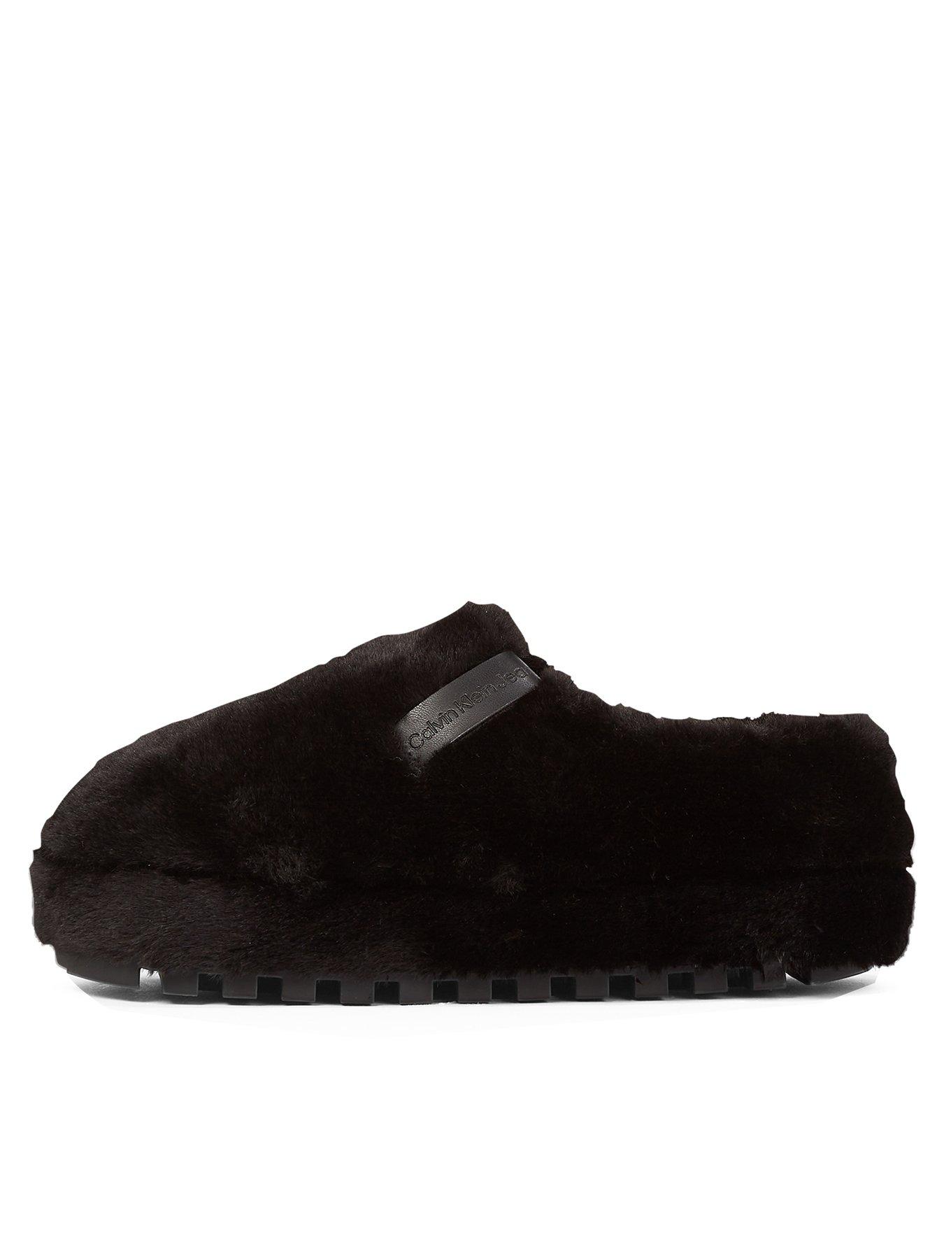 Image 1 of 6 of Calvin Klein Jeans Mule Slippers - Black