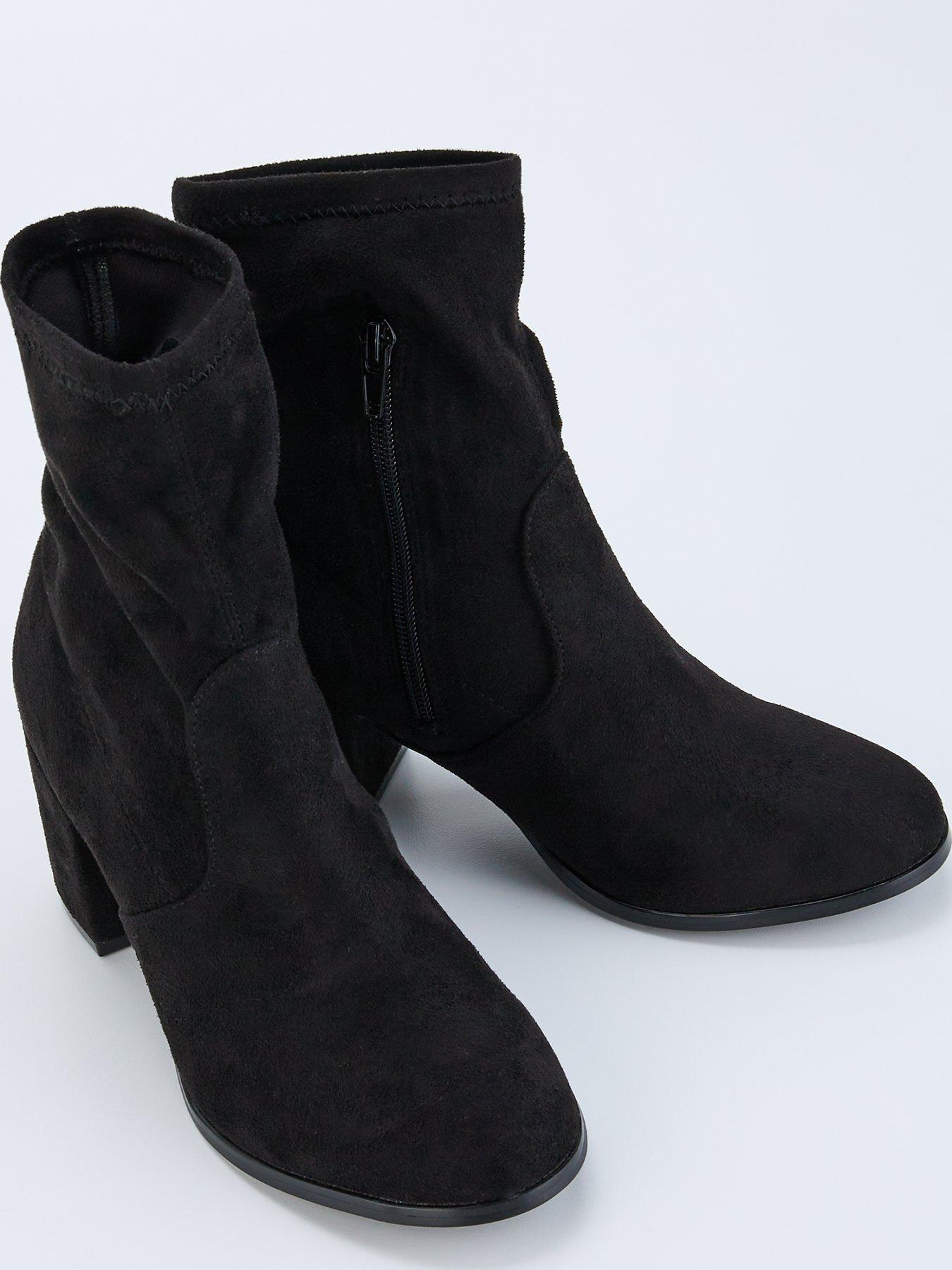 everyday-block-heel-sock-boot-blackoutfit