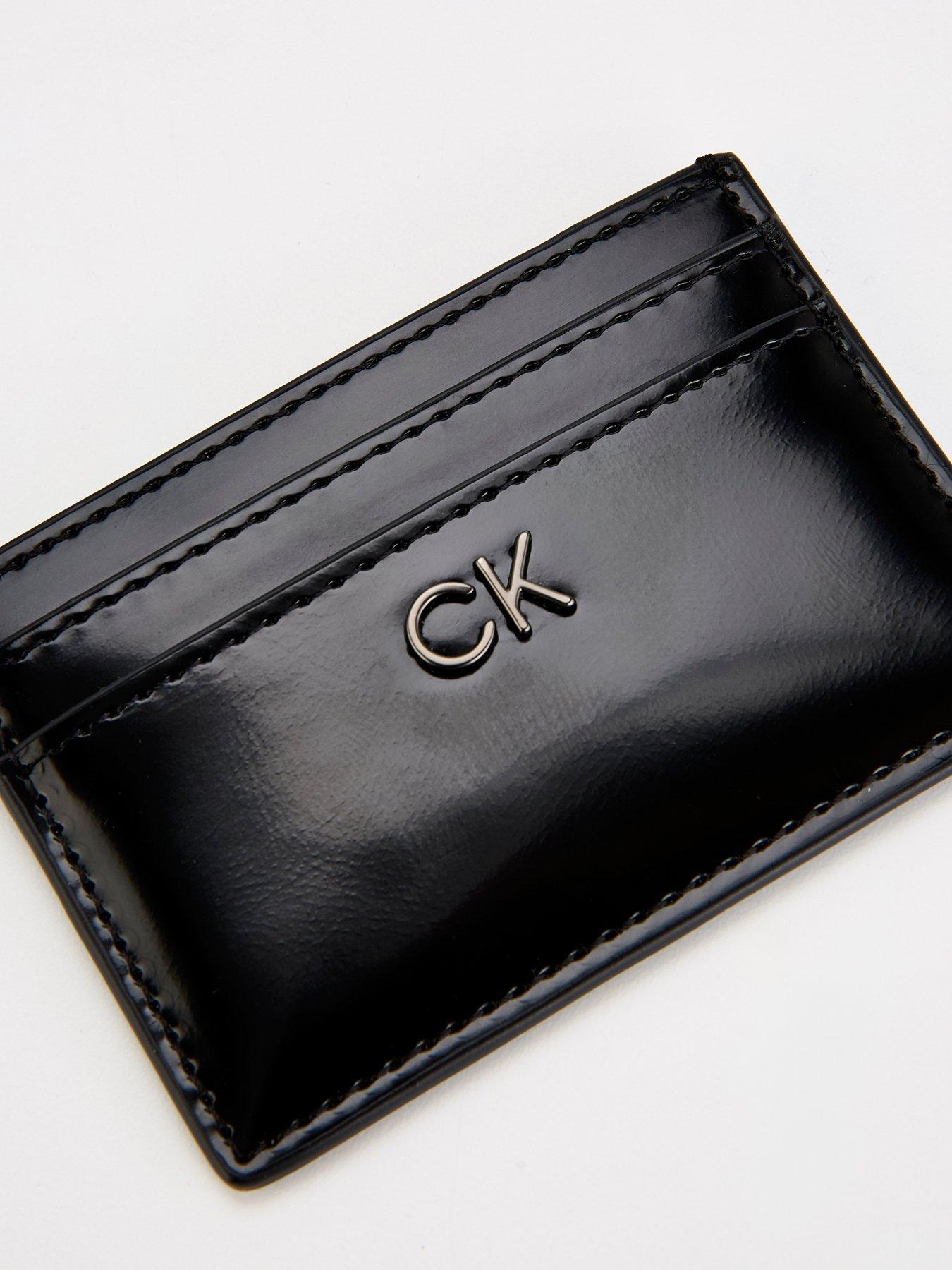 calvin-klein-metal-logo-cardholder-blackoutfit