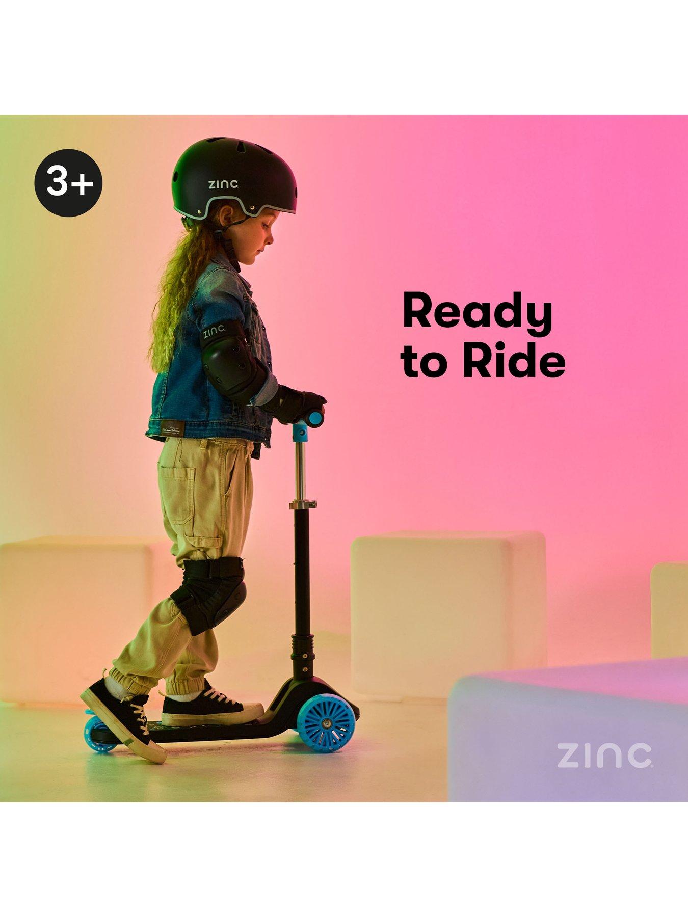 zinc-three-wheeled-folding-t-motion-shine-scooter-bluestillFront