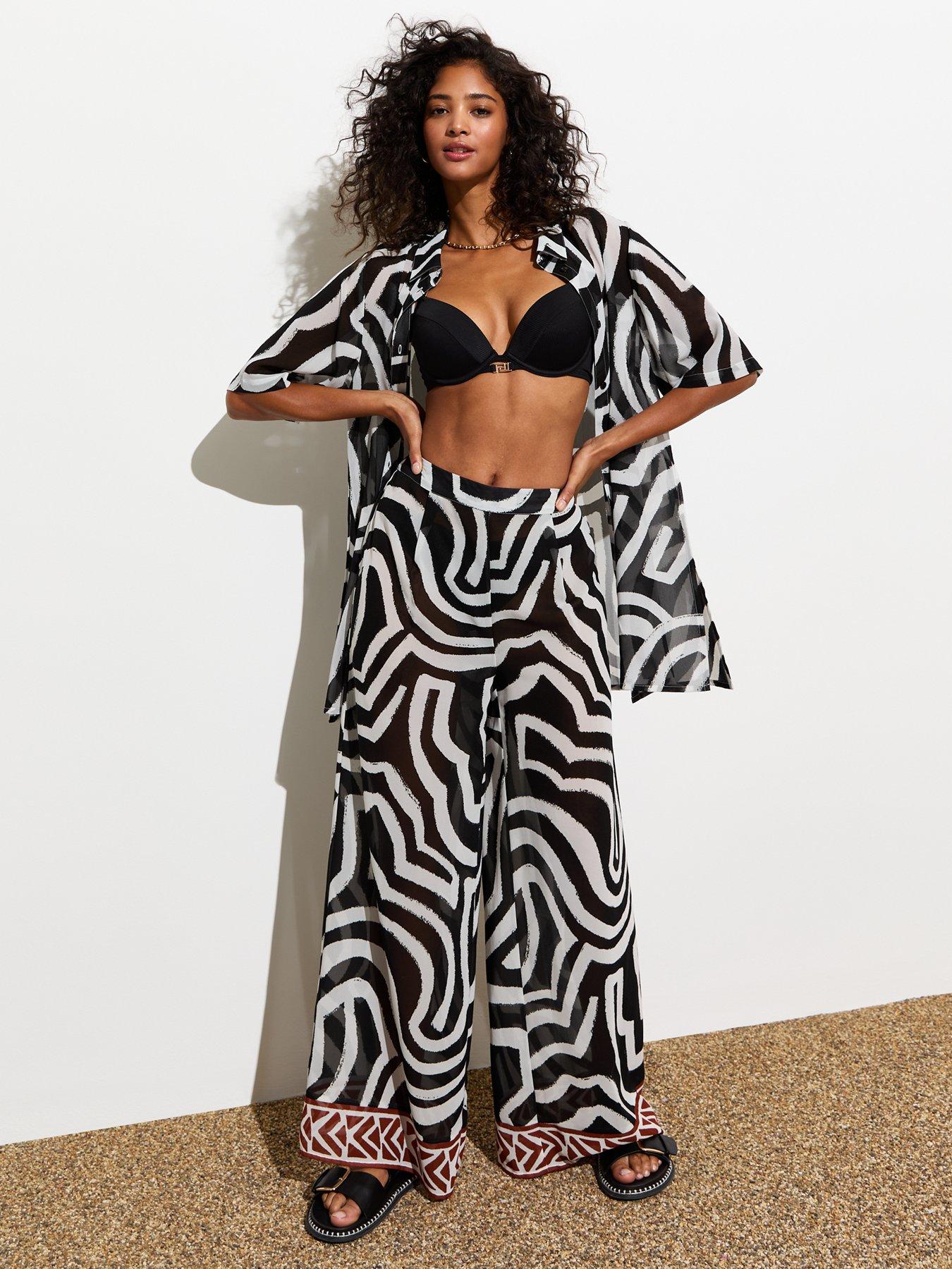 new-look-black-border-hem-print-abstract-wide-leg-beach-trousers