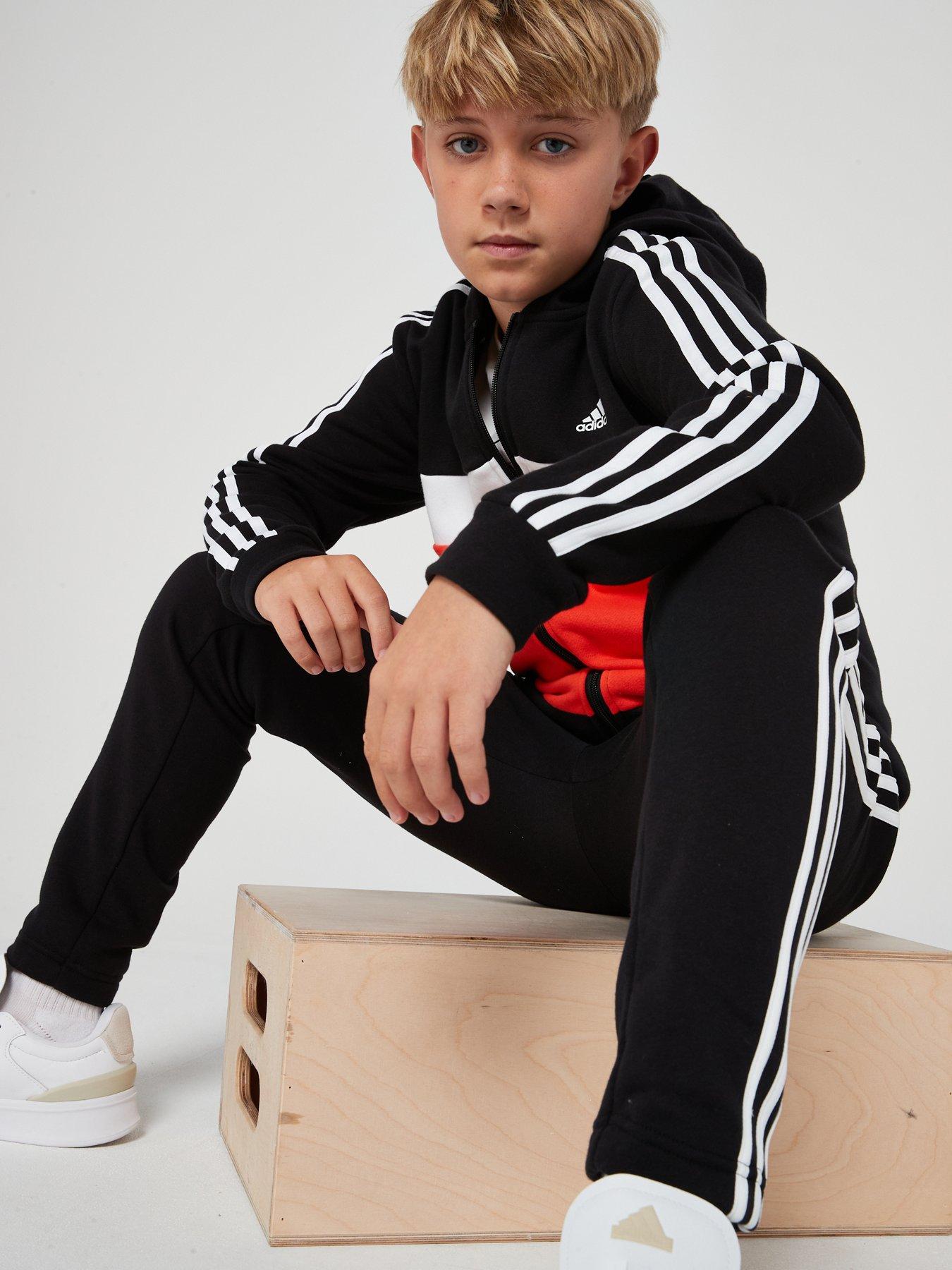 adidas-sportswear-junior-boys-essentials-3-stripe-tracksuit-blackredoutfit