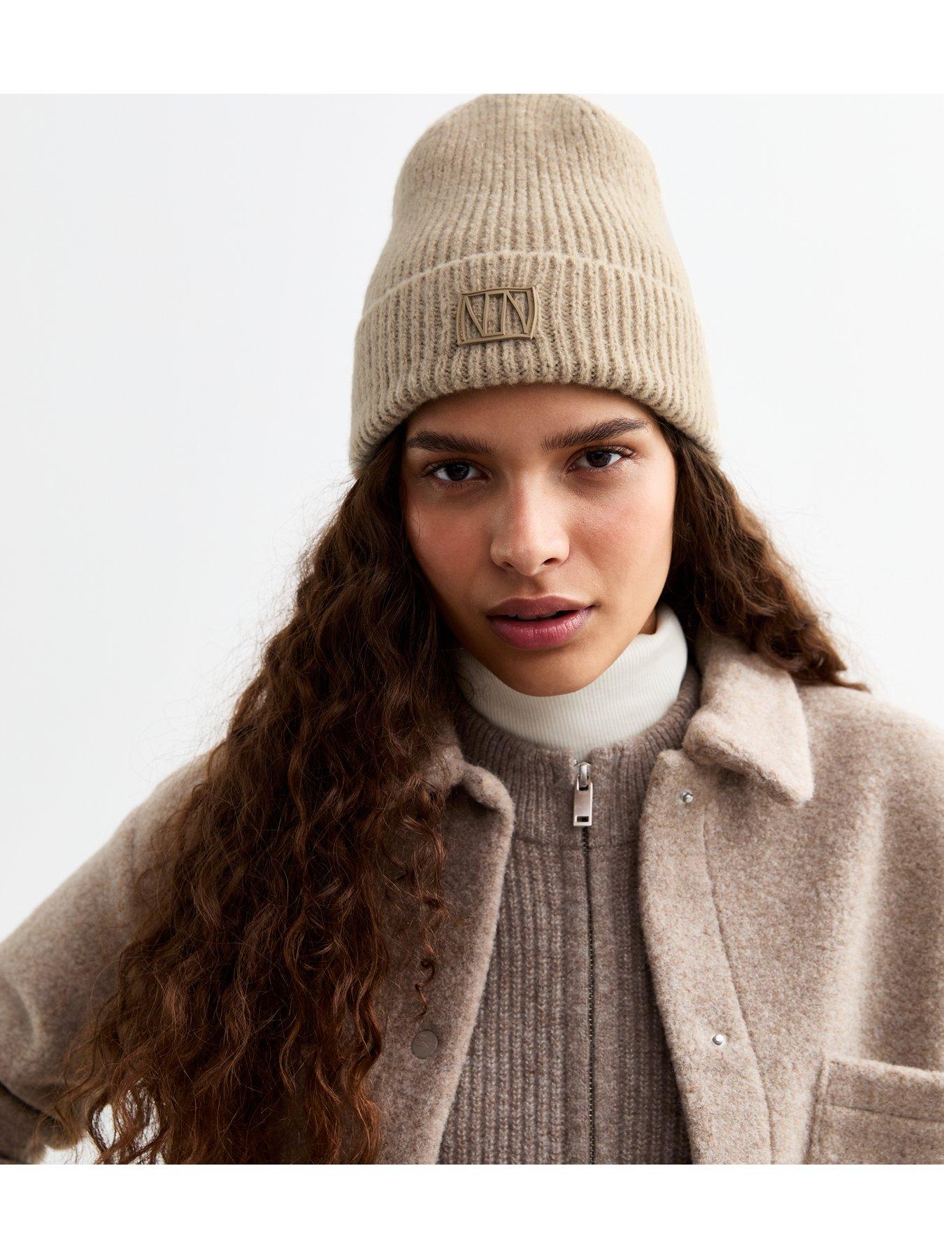 new-look-cream-logo-tab-rib-knit-beanie-hatstillFront