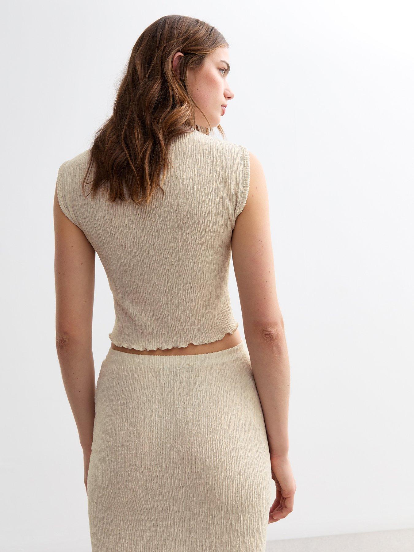 new-look-cream-funnel-neck-sleeveless-textured-topstillFront