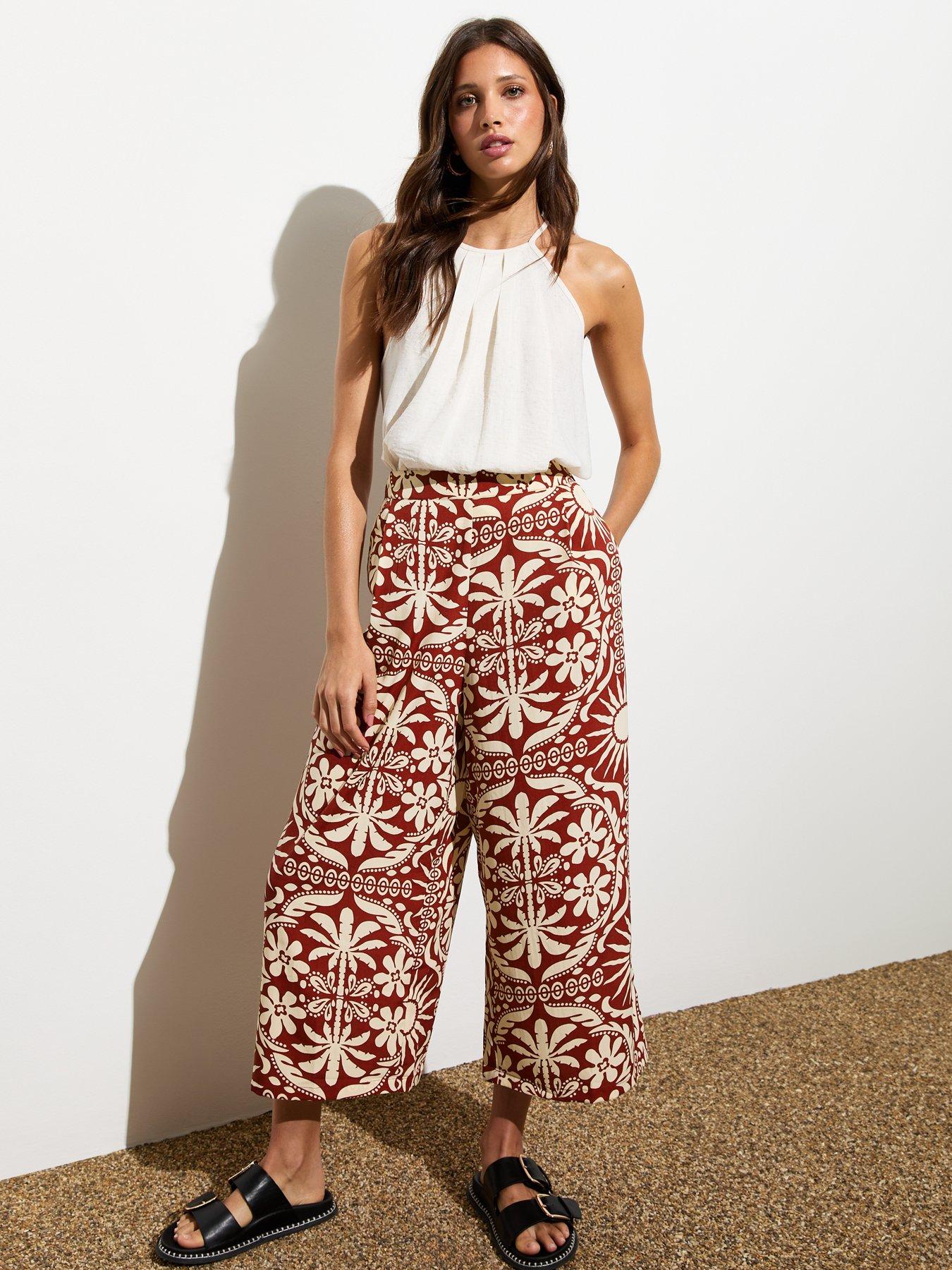 new-look-red-palm-print-cropped-wide-leg-trousers