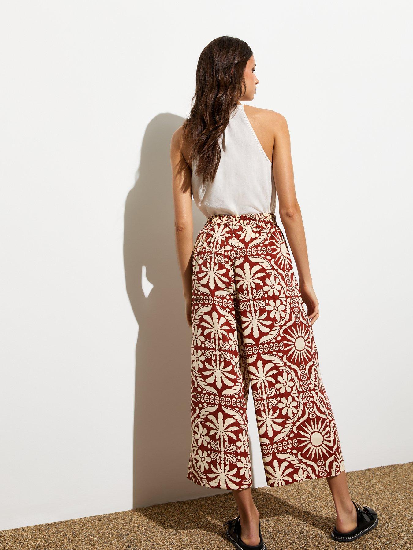 new-look-red-palm-print-cropped-wide-leg-trousersstillFront