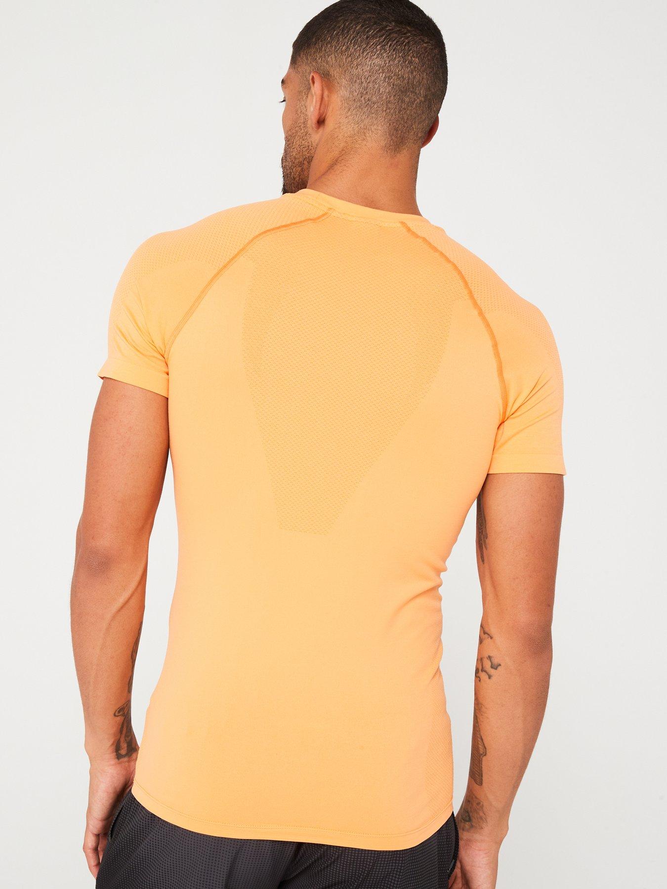 gym-king-mens-debossed-camo-seamless-tee-soft-orangestillFront