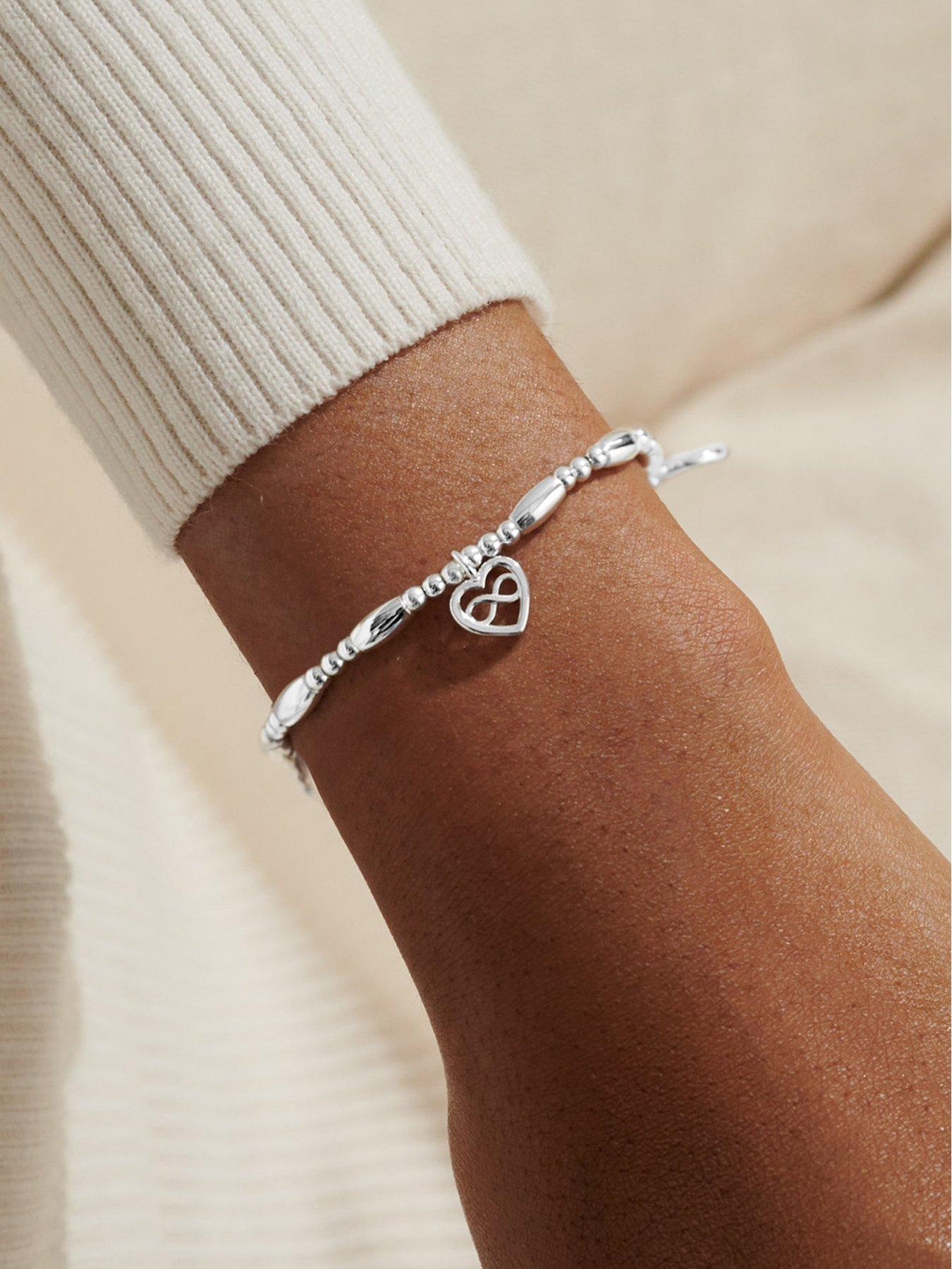 joma-jewellery-lifes-a-charm-family-bracelet-in-silver-platingstillFront