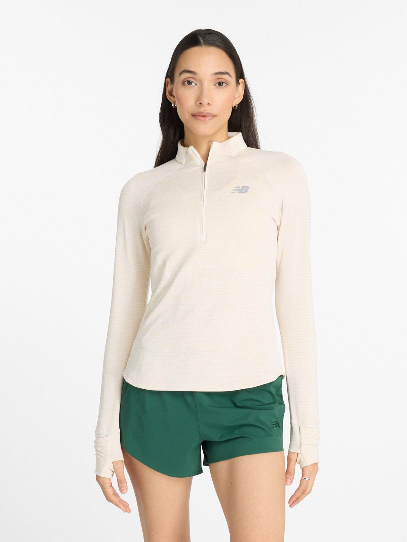 new-balance-womens-running-athletics-heat-grid-half-zip-beigefront