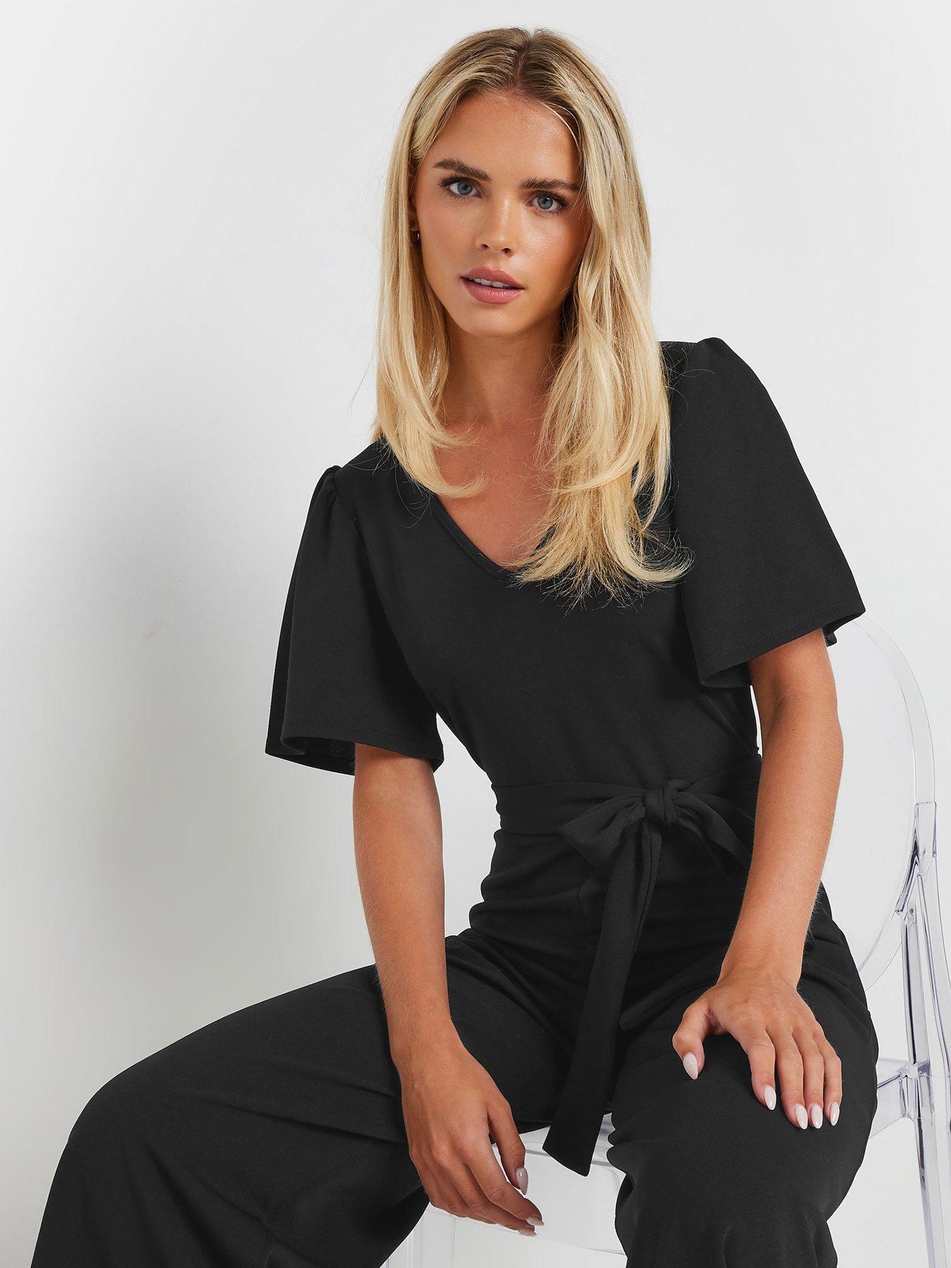 mco-petite-angel-sleeve-jumpsuit-blackoutfit