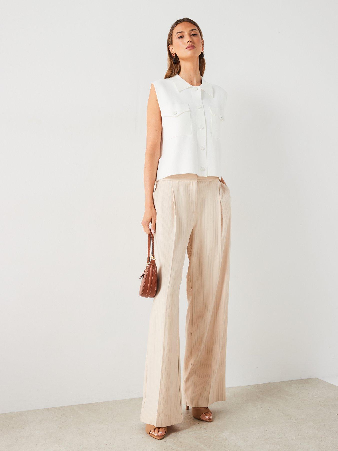 mango-sleeveless-pocket-topback