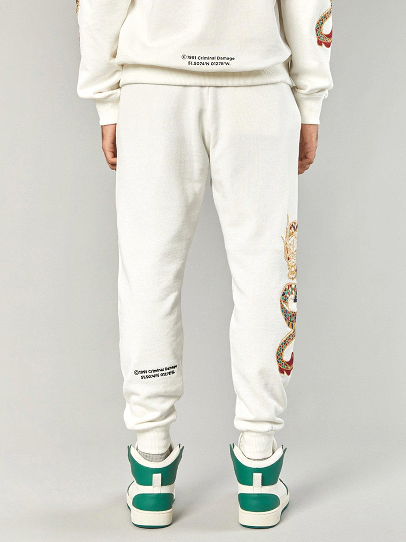 criminal-damage-criminal-damage-gold-dragon-joggers-off-whitestillFront