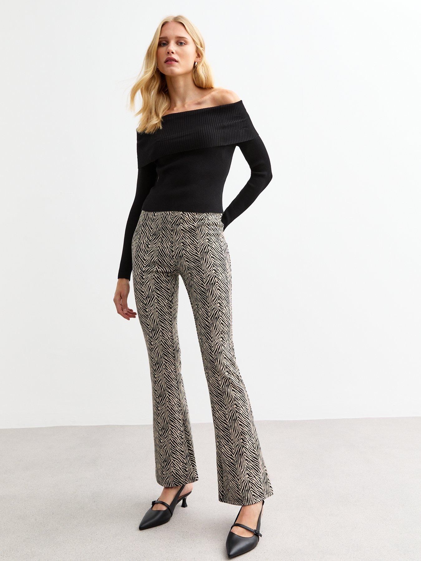 new-look-zebra-print-woven-flared-jersey-trousers-blackfront