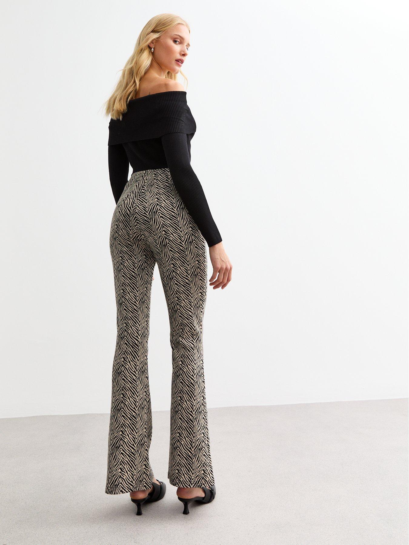 new-look-zebra-print-woven-flared-jersey-trousers-blackstillFront